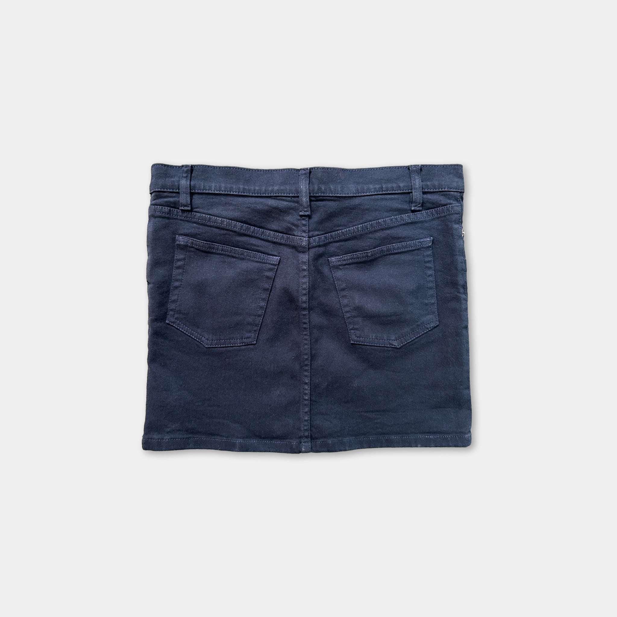 A dark blue denim skirt with a belt and two pockets.
