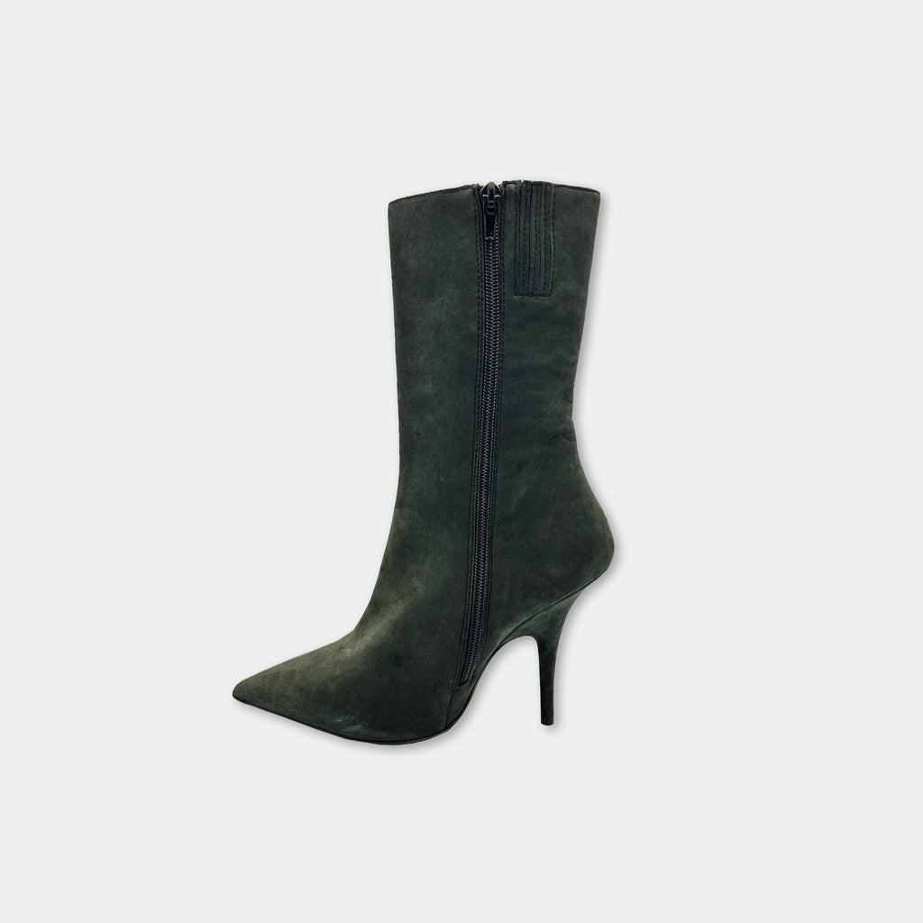 A single, dark green suede ankle boot with a pointed toe and a zipper closure.