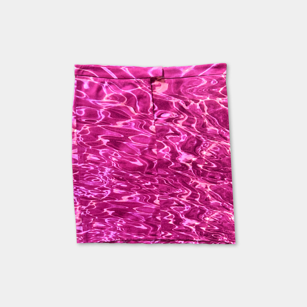 A pink skirt with a water-like pattern, creating a visually striking and vibrant design.