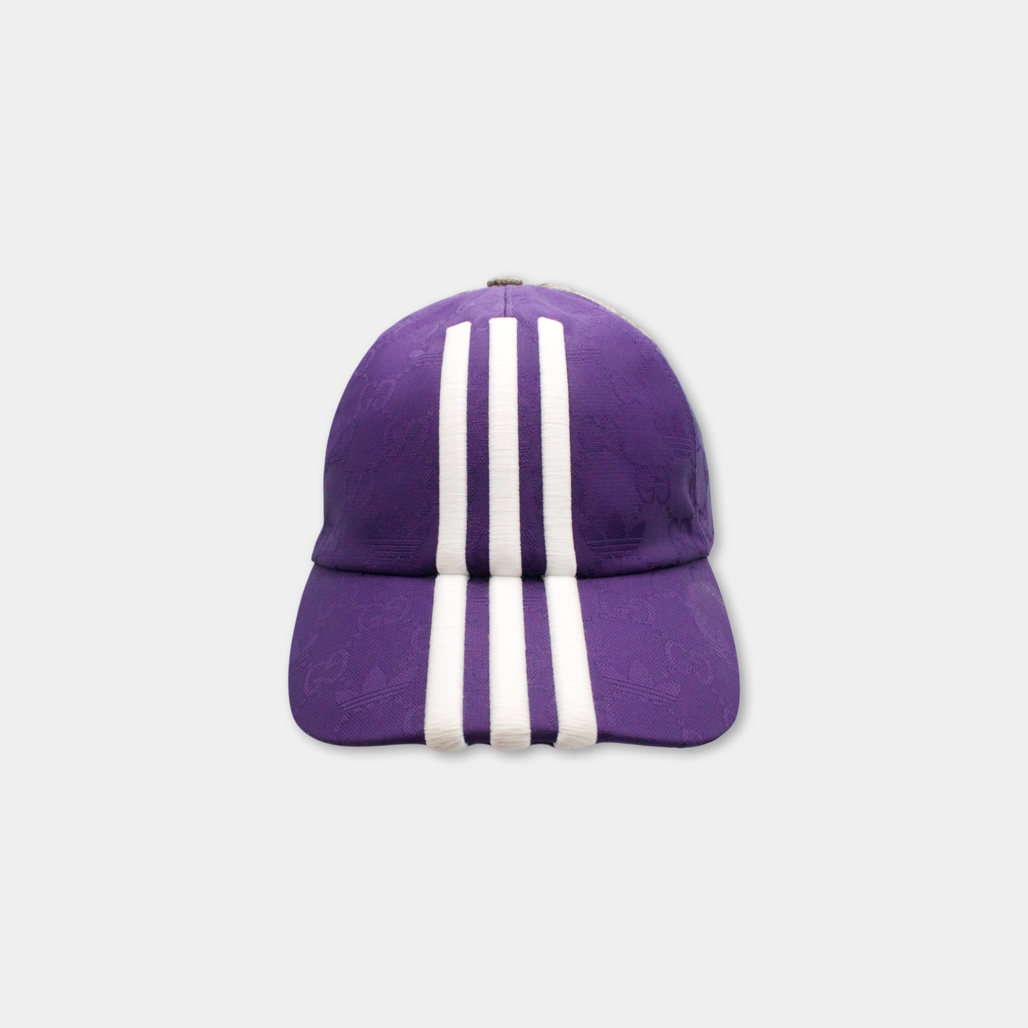 A purple baseball cap with white stripes.