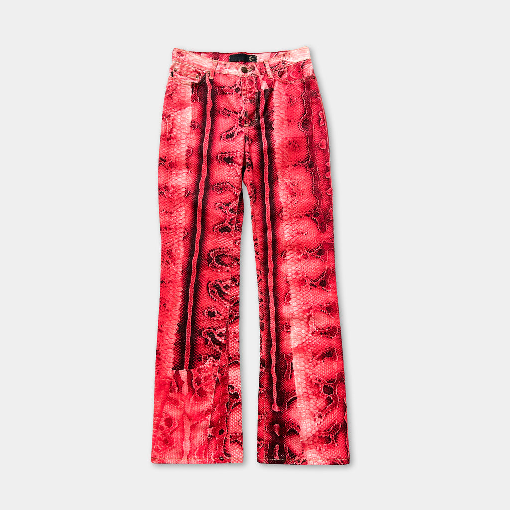 A pair of red pants with a distinctive snake skin pattern.