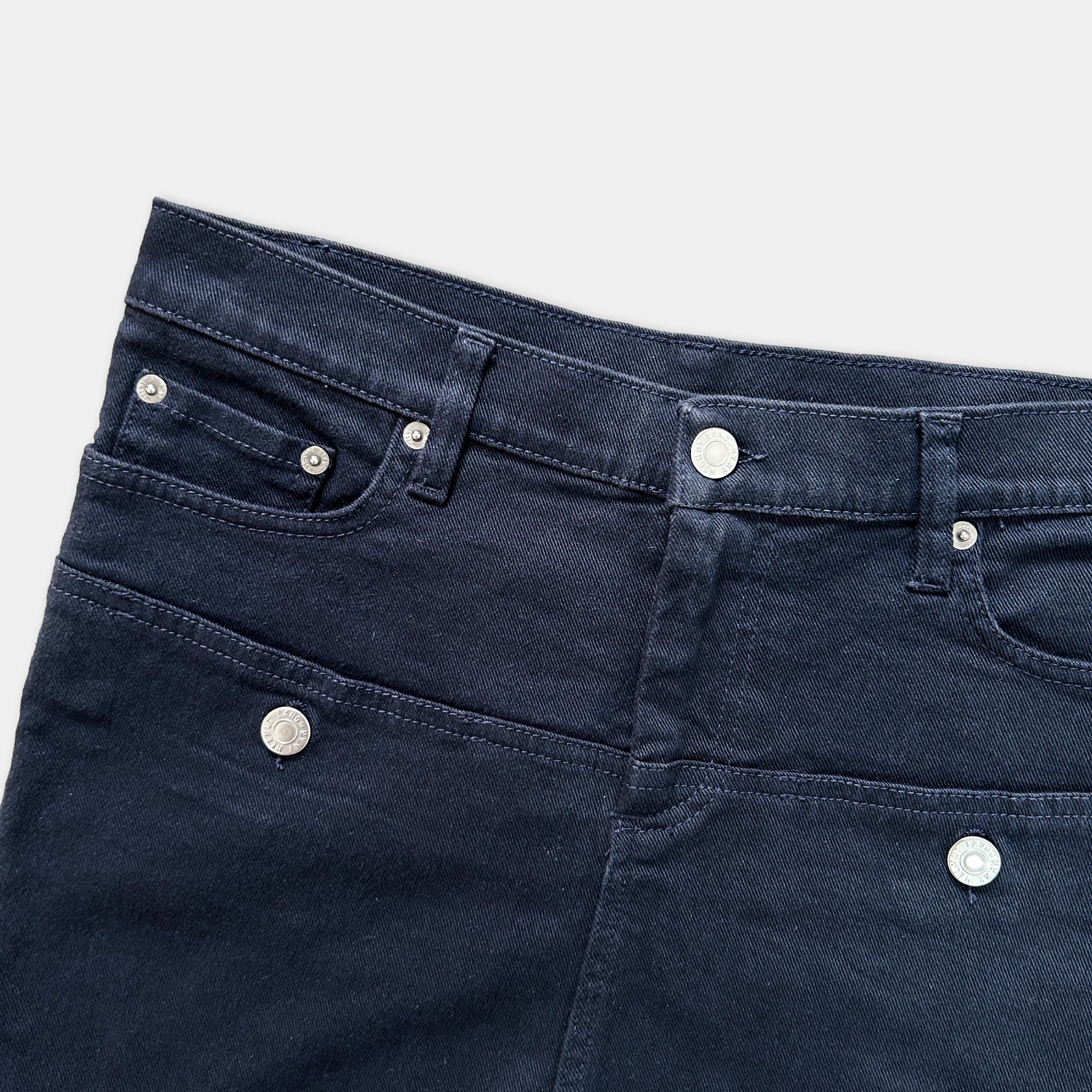 A pair of dark blue jeans with a pocket on the front.