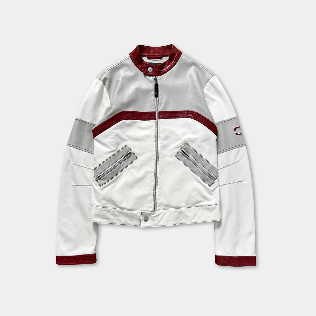 A white and red jacket with a red collar and zipper.