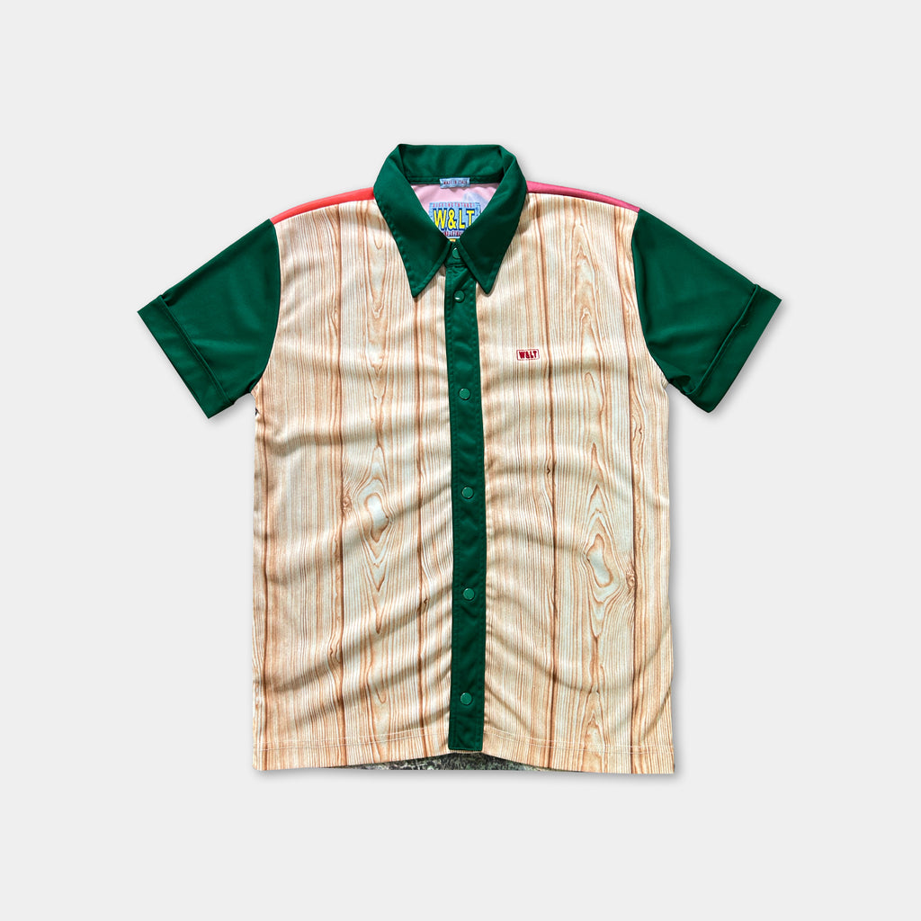 A shirt with a wood grain pattern and green sleeves, featuring a collar and buttons.