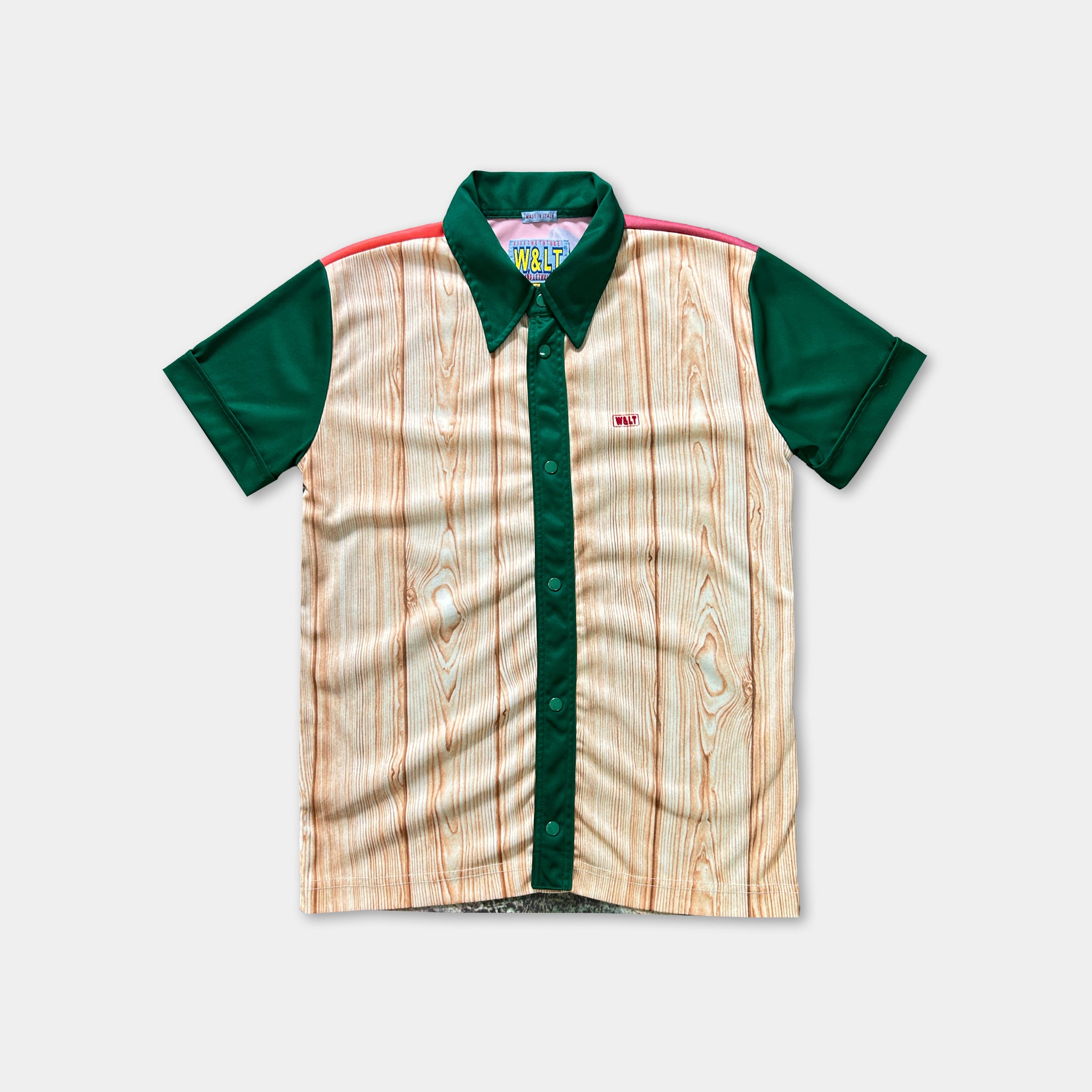 A shirt with a wood grain pattern and green sleeves, featuring a collar and buttons.