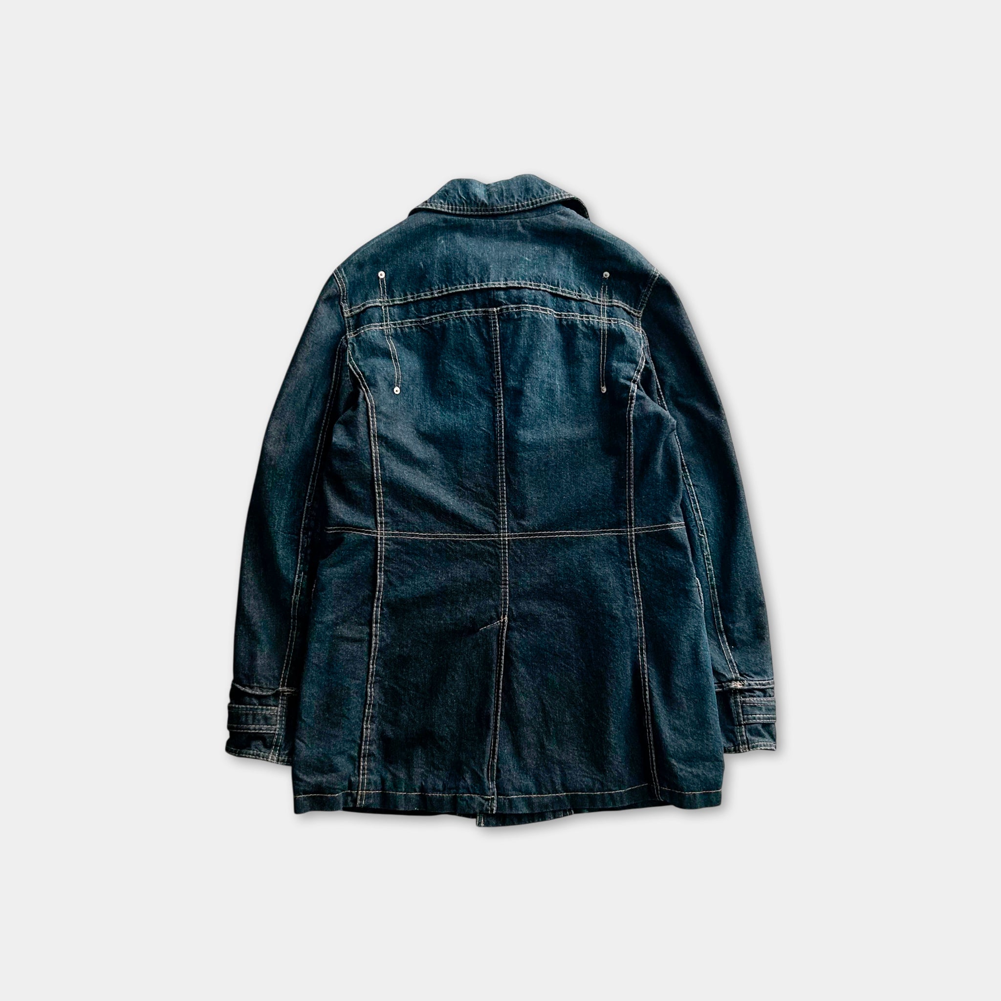 a denim jacket with a high collar and long sleeves, laid out against a plain background.