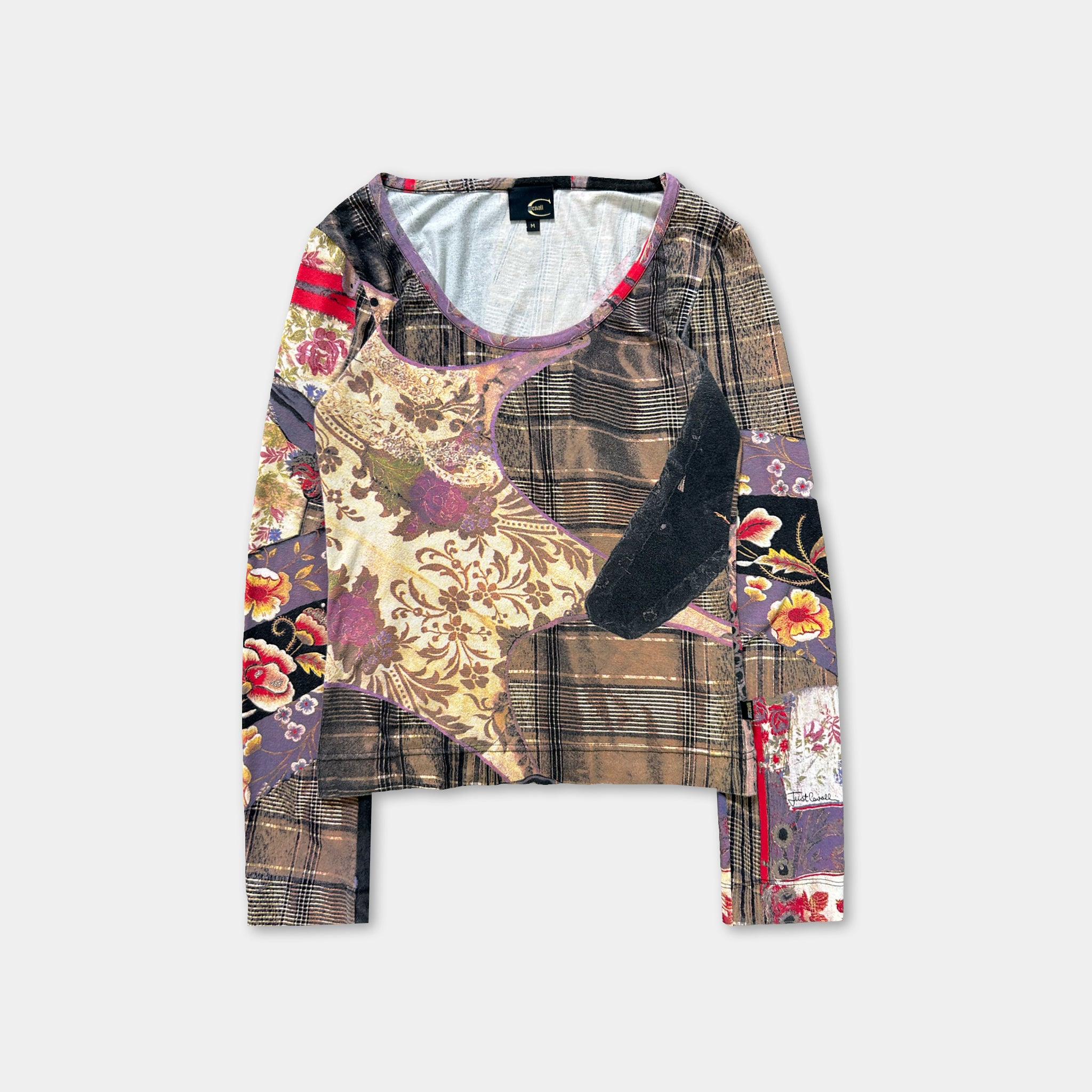 a long-sleeved top with a floral print design.