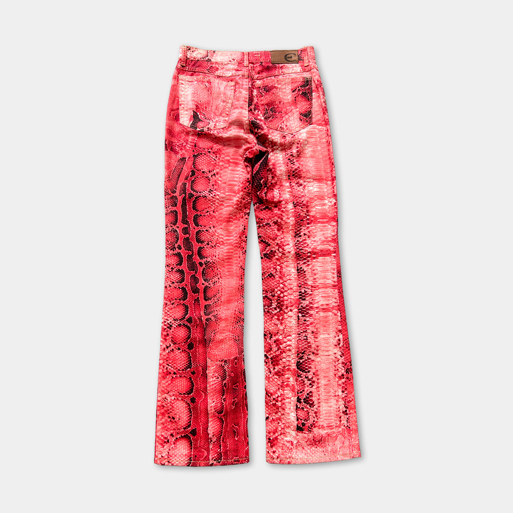 A pair of red pants with a distinctive snake skin pattern.