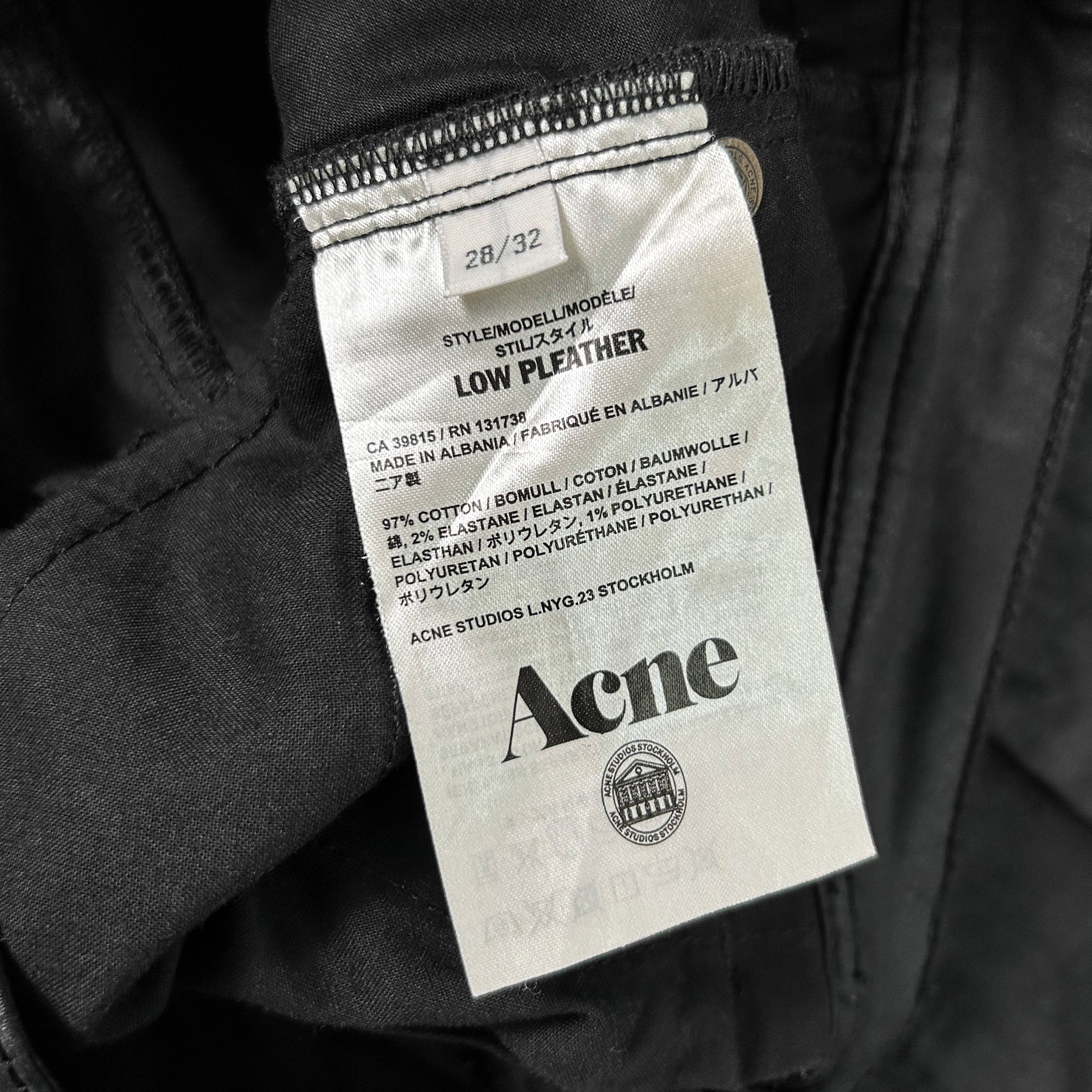 a close-up view of a label on a piece of clothing, likely a garment or textile product.