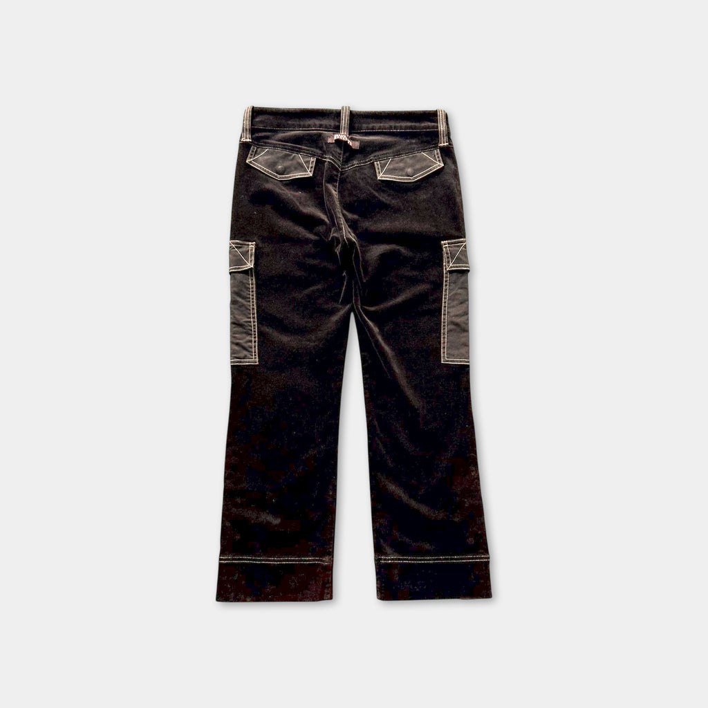 A pair of black cargo pants with pockets and a belt.