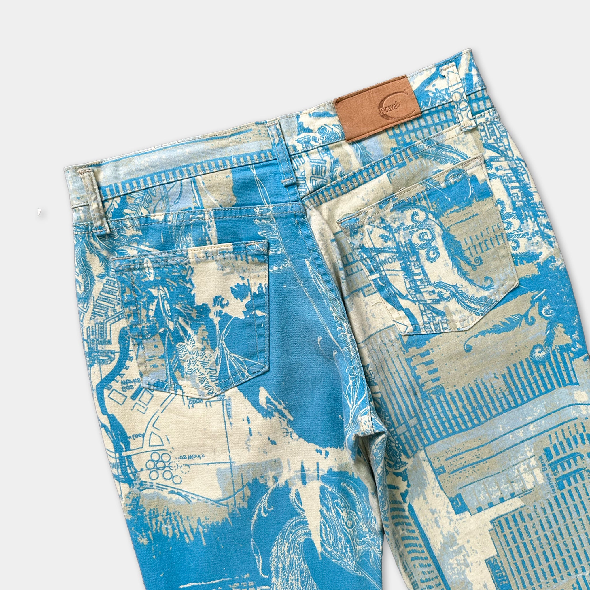 a pair of blue and white patterned jeans with a distinctive design.