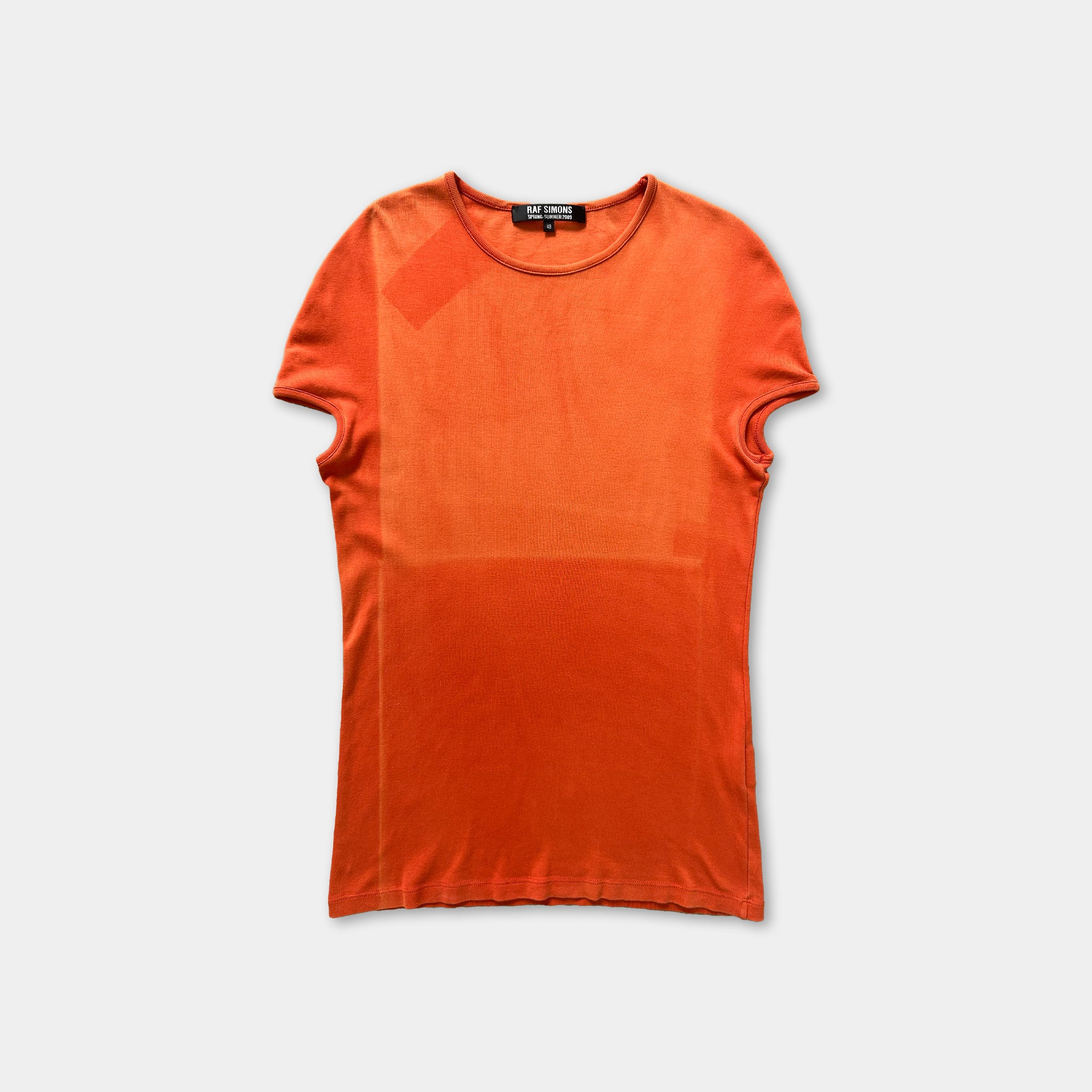 a bright orange t-shirt against a white background.