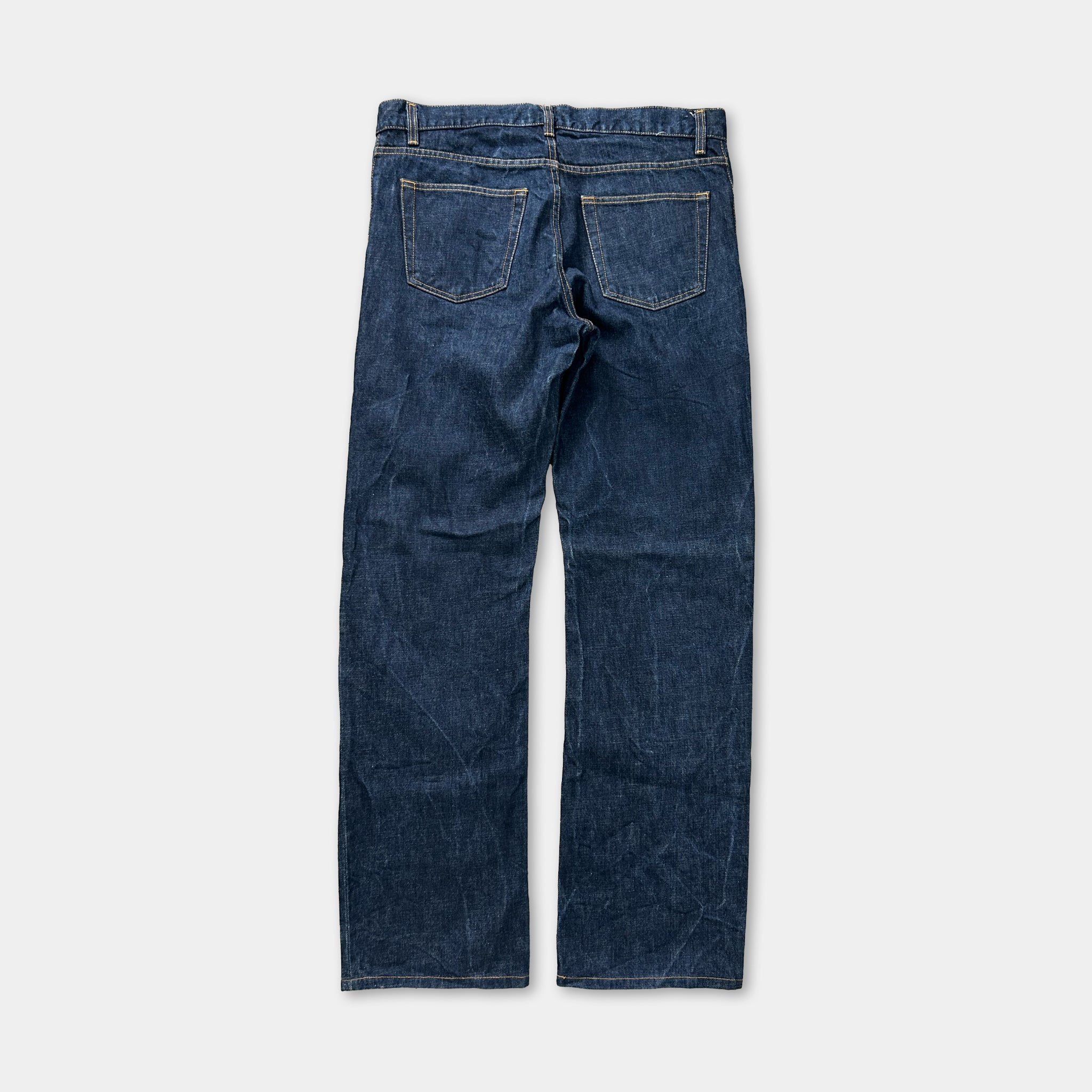 A pair of blue jeans with a classic design, featuring a pocket on the back and a zipper running down the front.