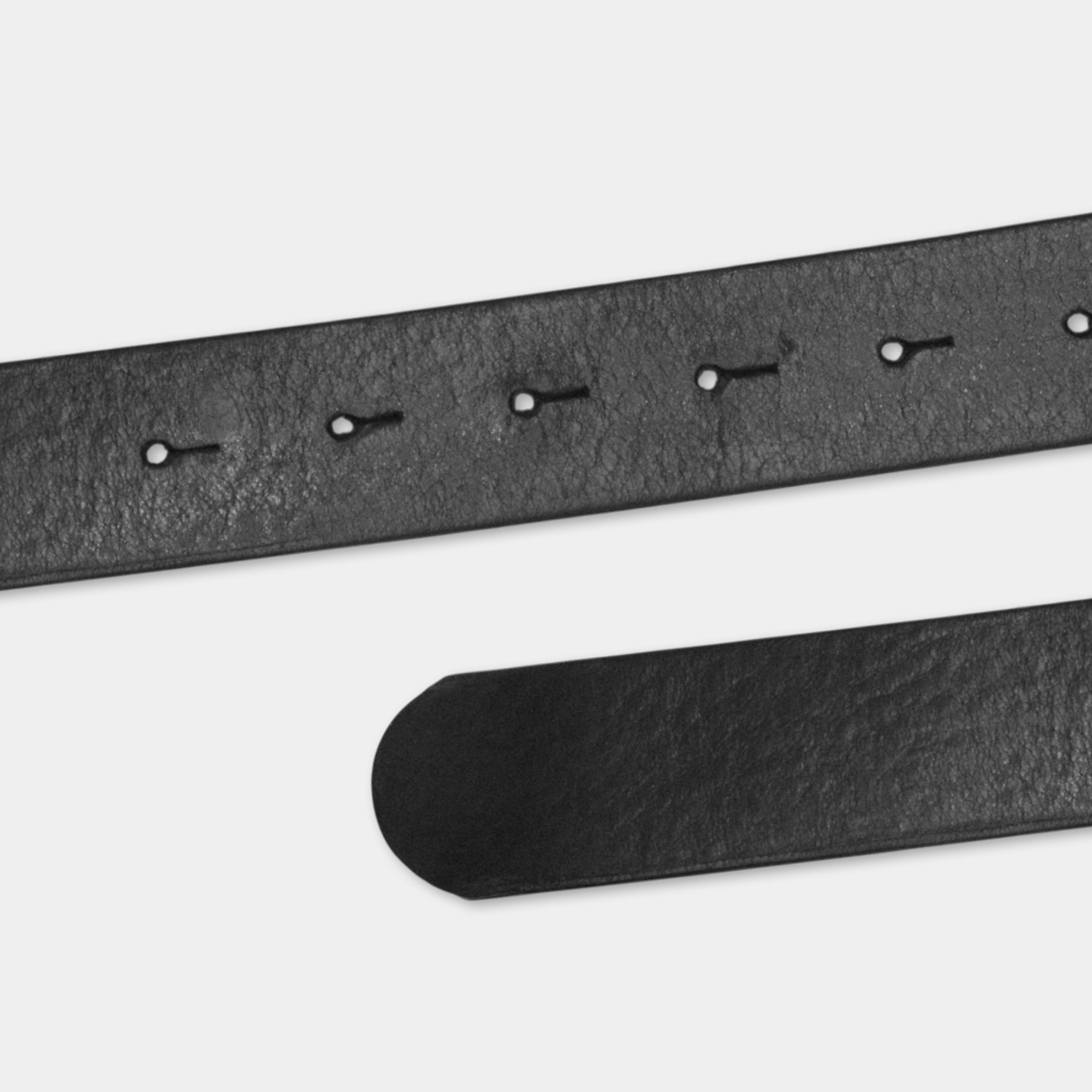 A close-up view of a black leather belt with a row of holes in it.