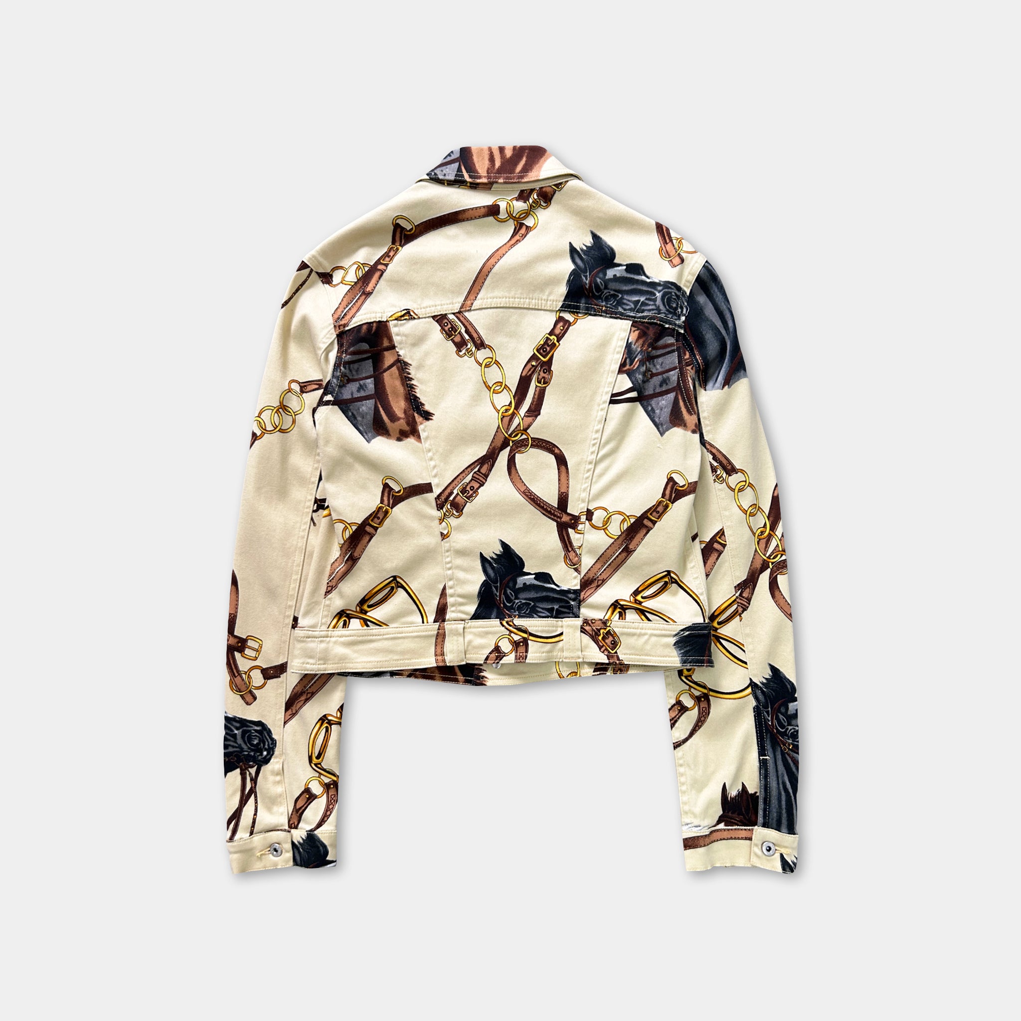 a beige jacket with a pattern of horses and chains on the back.