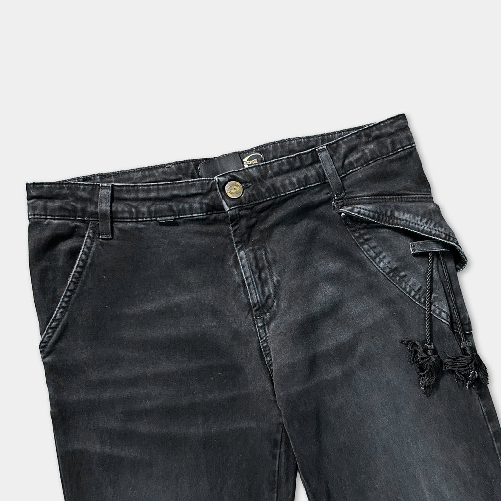 A pair of black jeans with a button waistband and a small pocket on the front.