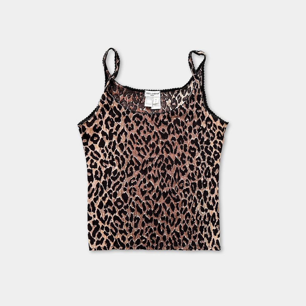 A leopard print tank top is shown against a white background.