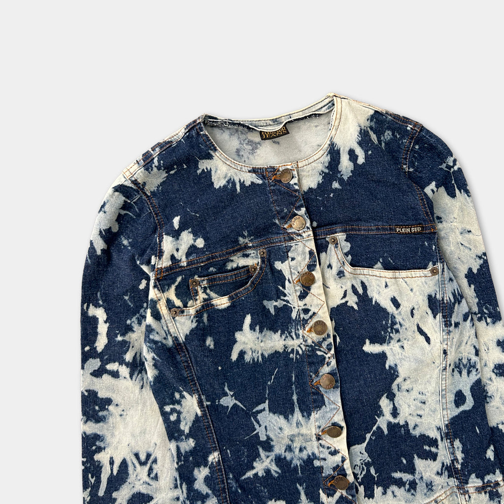 A blue denim jacket with a white tie-dye pattern, featuring a collar, buttons, and pockets.
