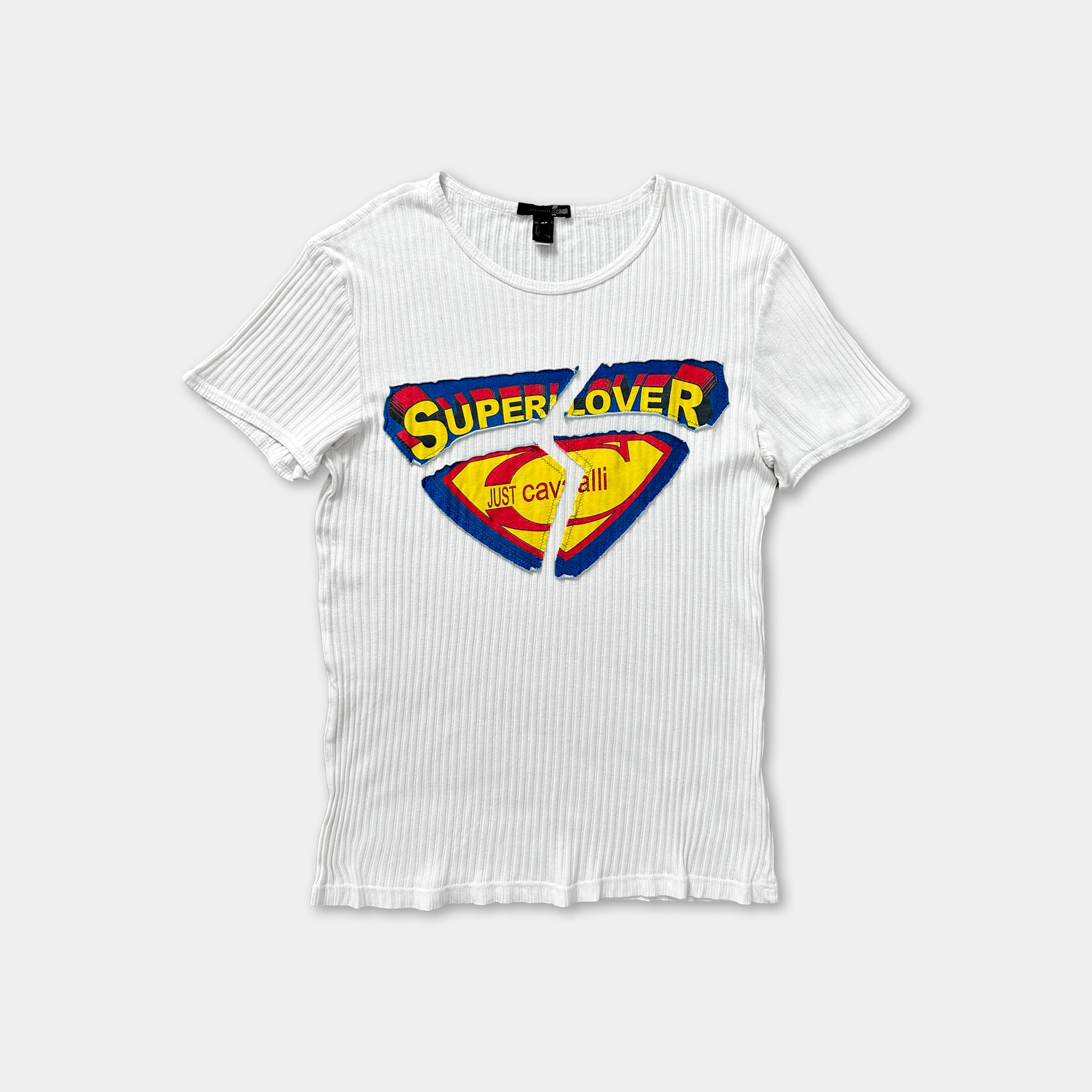 A white ribbed t-shirt with a Superman logo and the text "Super Lover" printed on it.