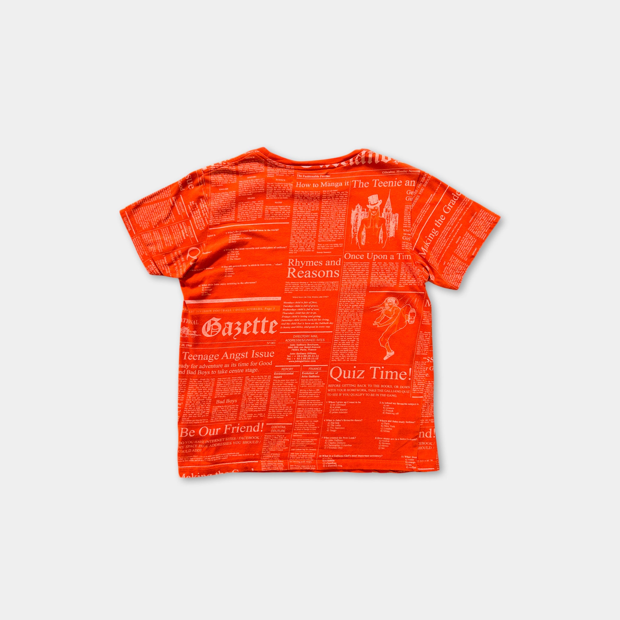 The image is a red t-shirt with a newspaper-style print on it.