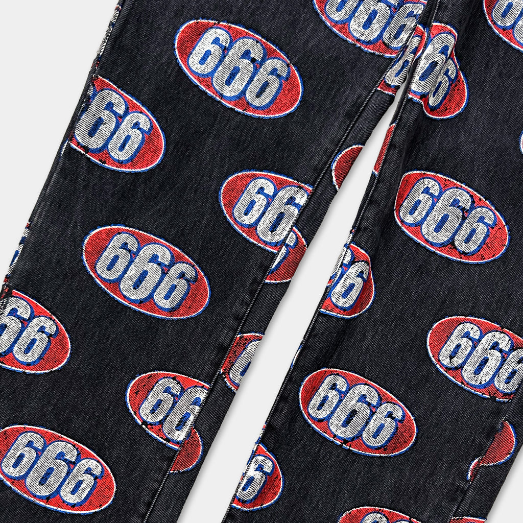 a pair of black jeans with a repeating pattern of the number "666" in red and white colors.