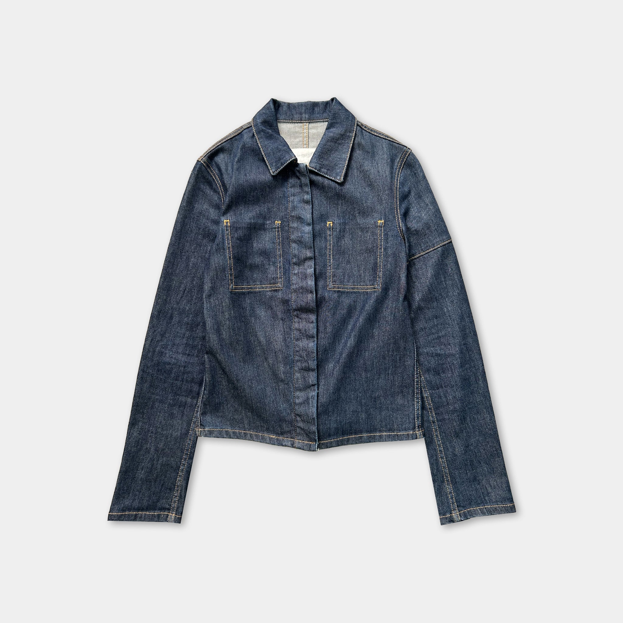 A blue denim jacket with a button-down front and two pockets, displayed against a white background.