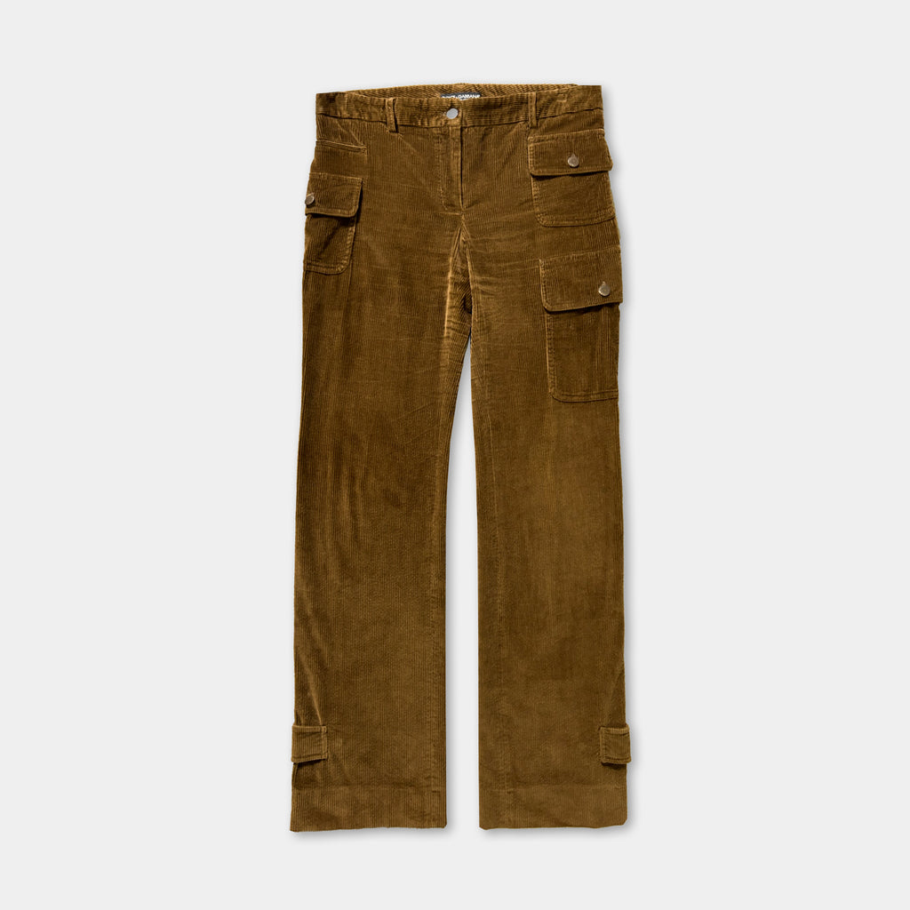 A pair of brown corduroy pants with pockets on the front.