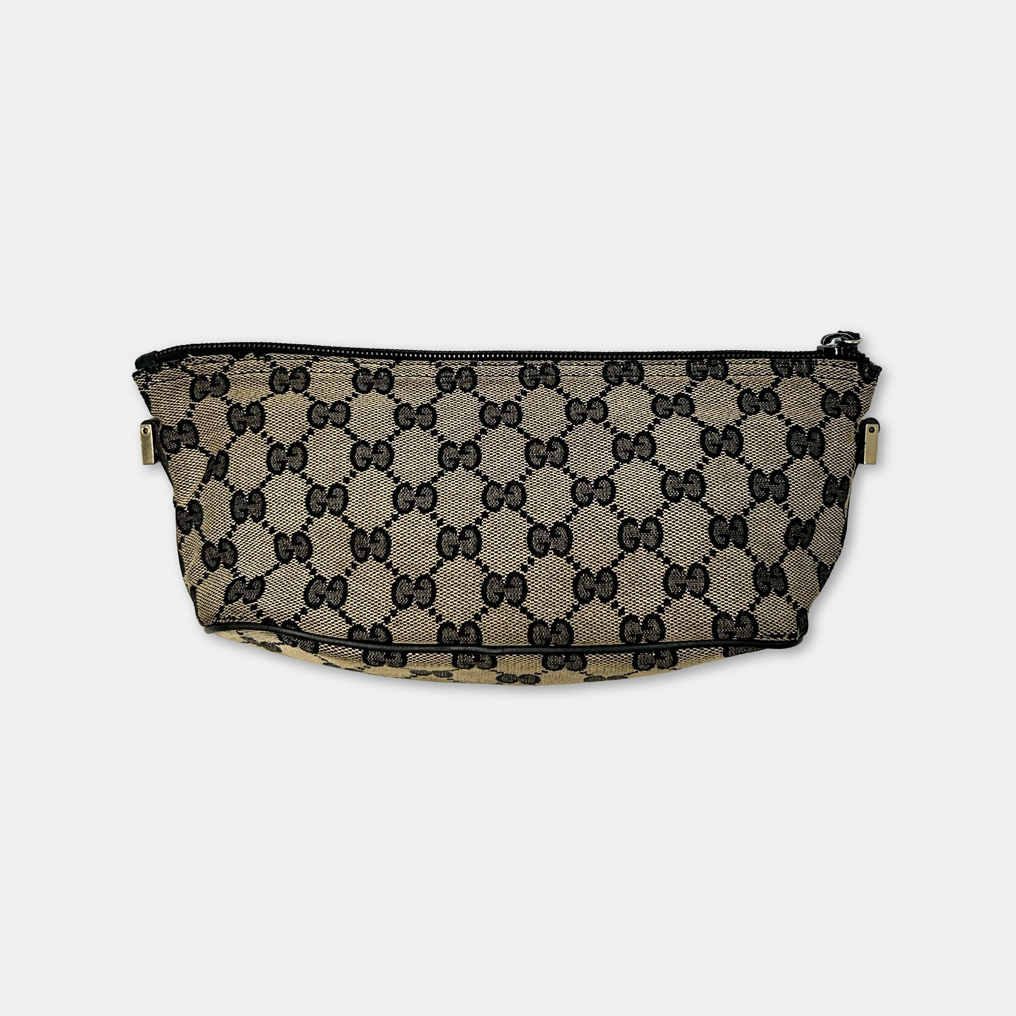 A black and white patterned handbag with a distinctive Gucci-inspired design.