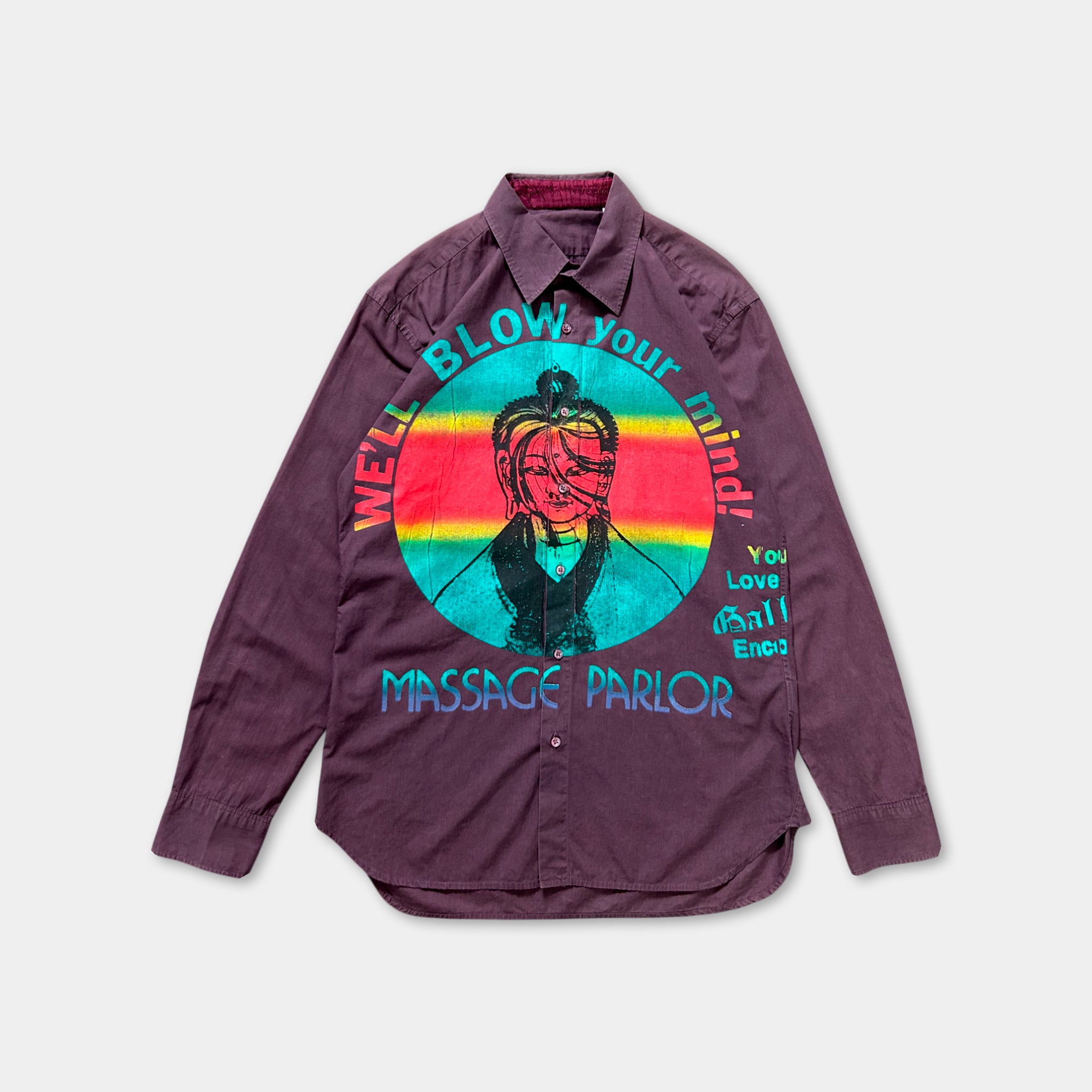 a purple shirt with a graphic design on it.