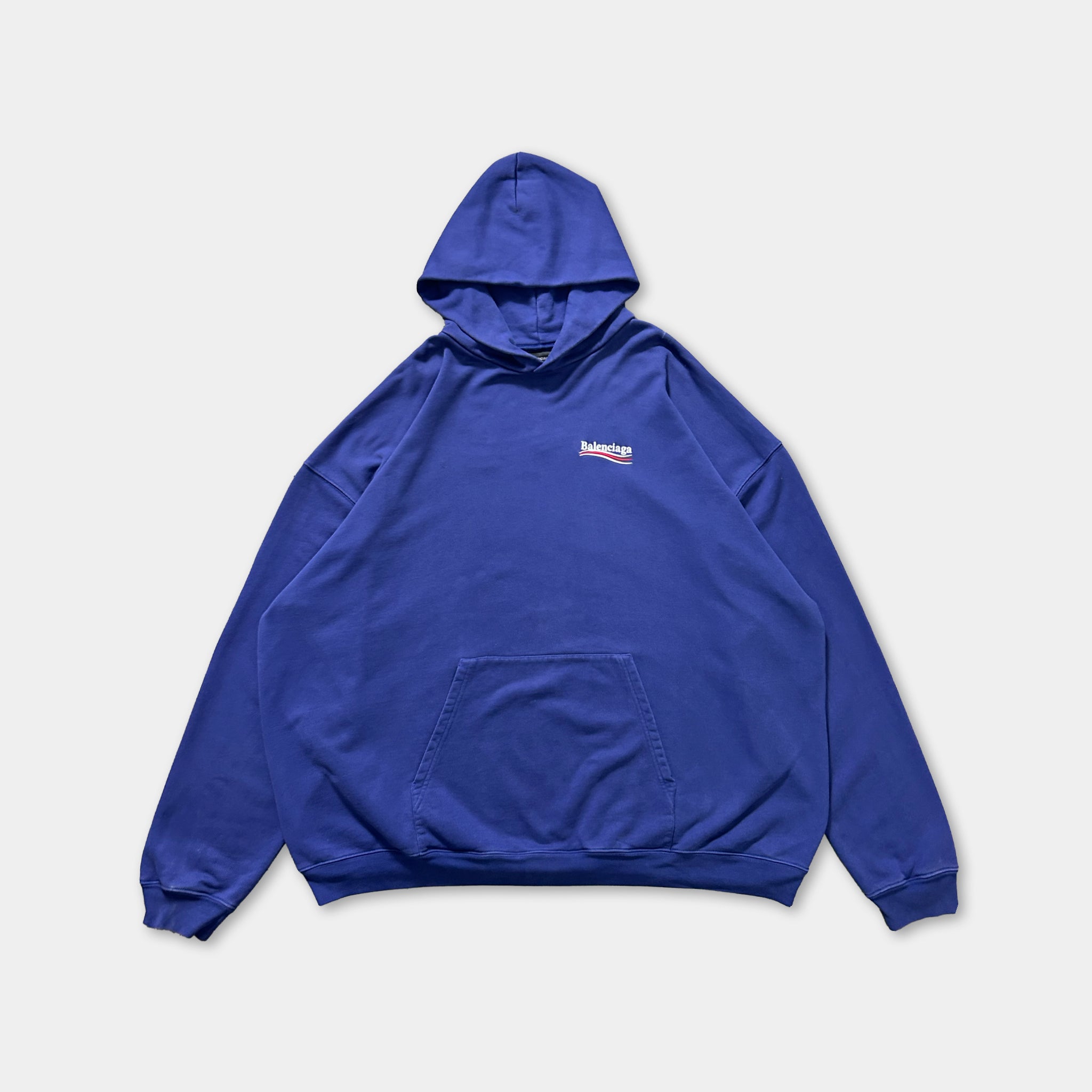 A large navy blue hooded sweatshirt with a small logo on the front.