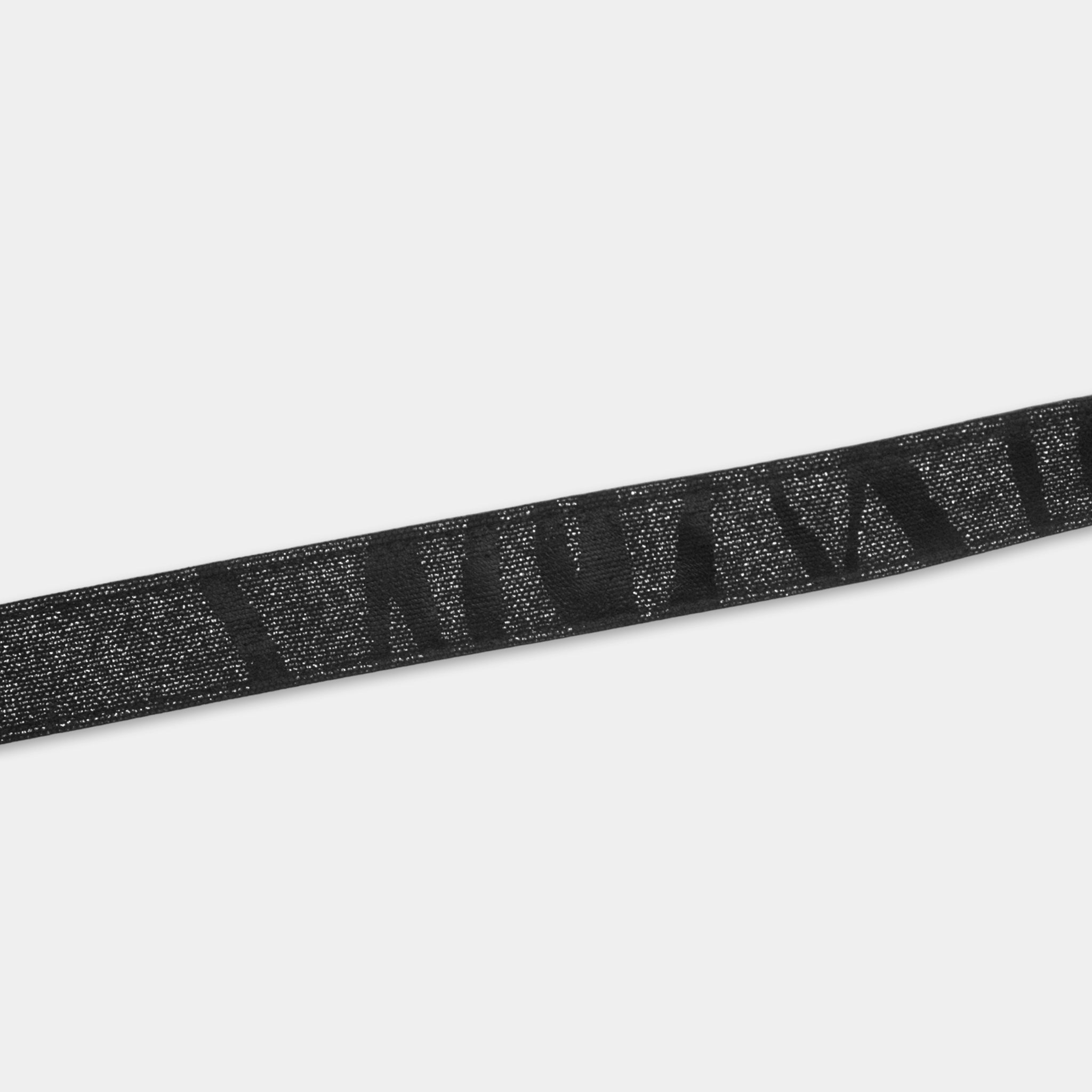 A black strap with a textured pattern.