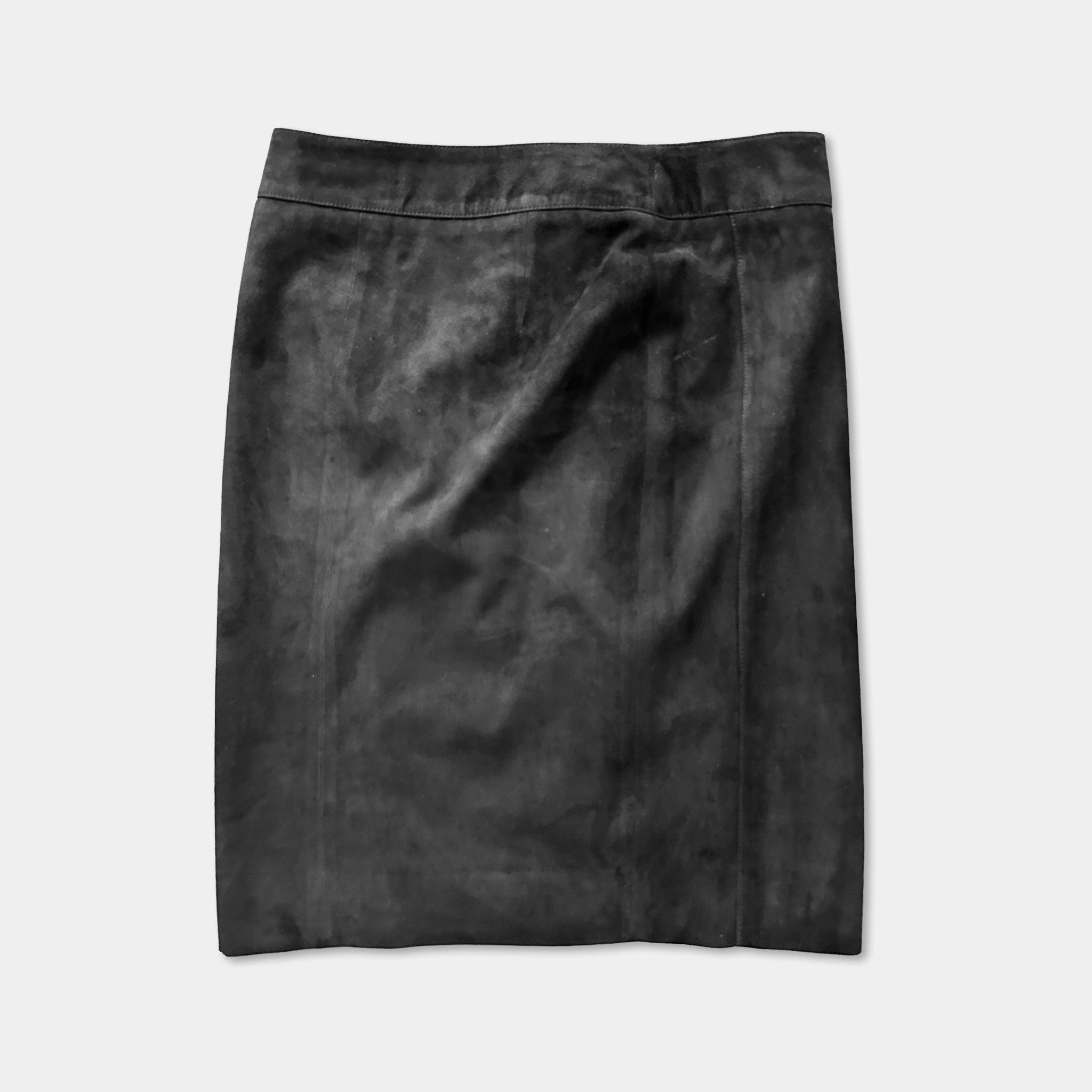A black, form-fitting skirt is shown against a plain background.