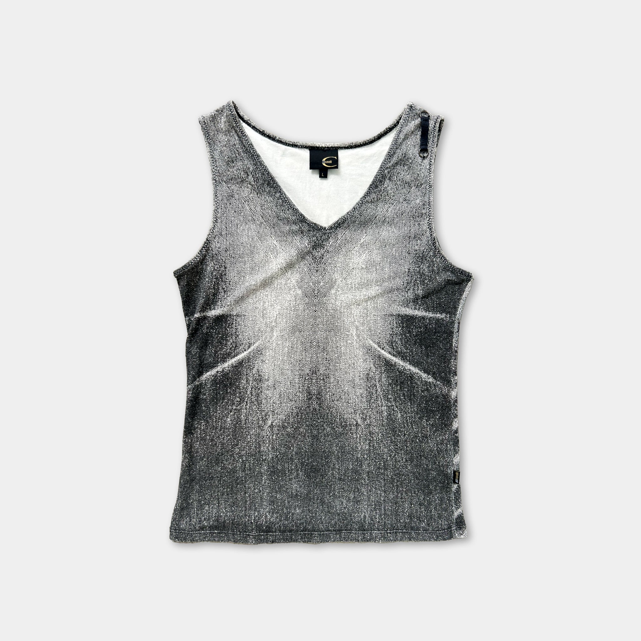 a gray tank top with a distinctive black and white pattern.