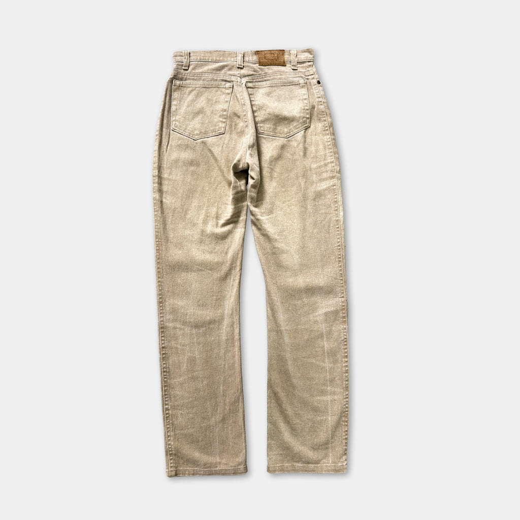 A pair of tan-colored, high-waisted jeans with a classic, relaxed fit.
