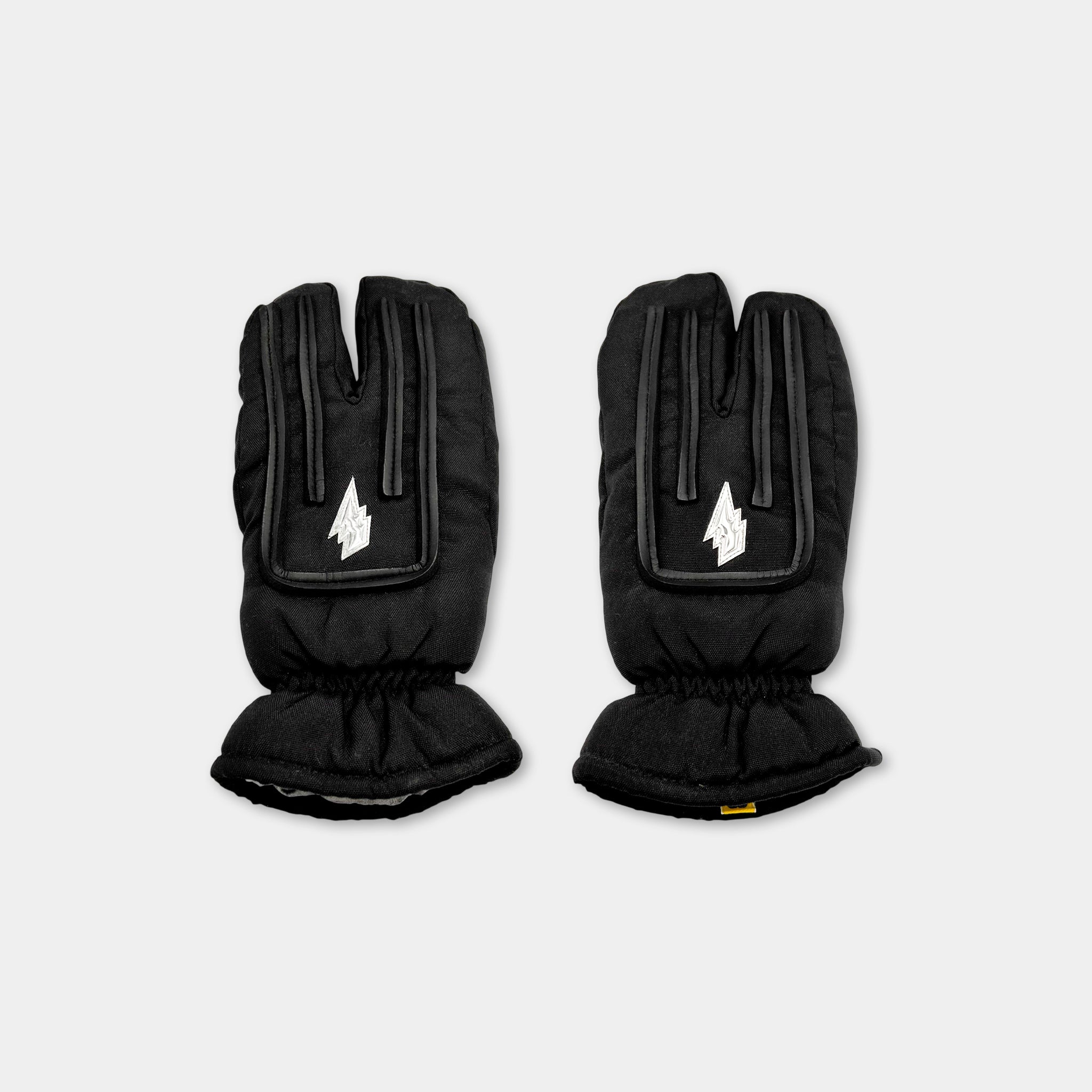 A pair of black gloves with white lightning bolt designs on the front.