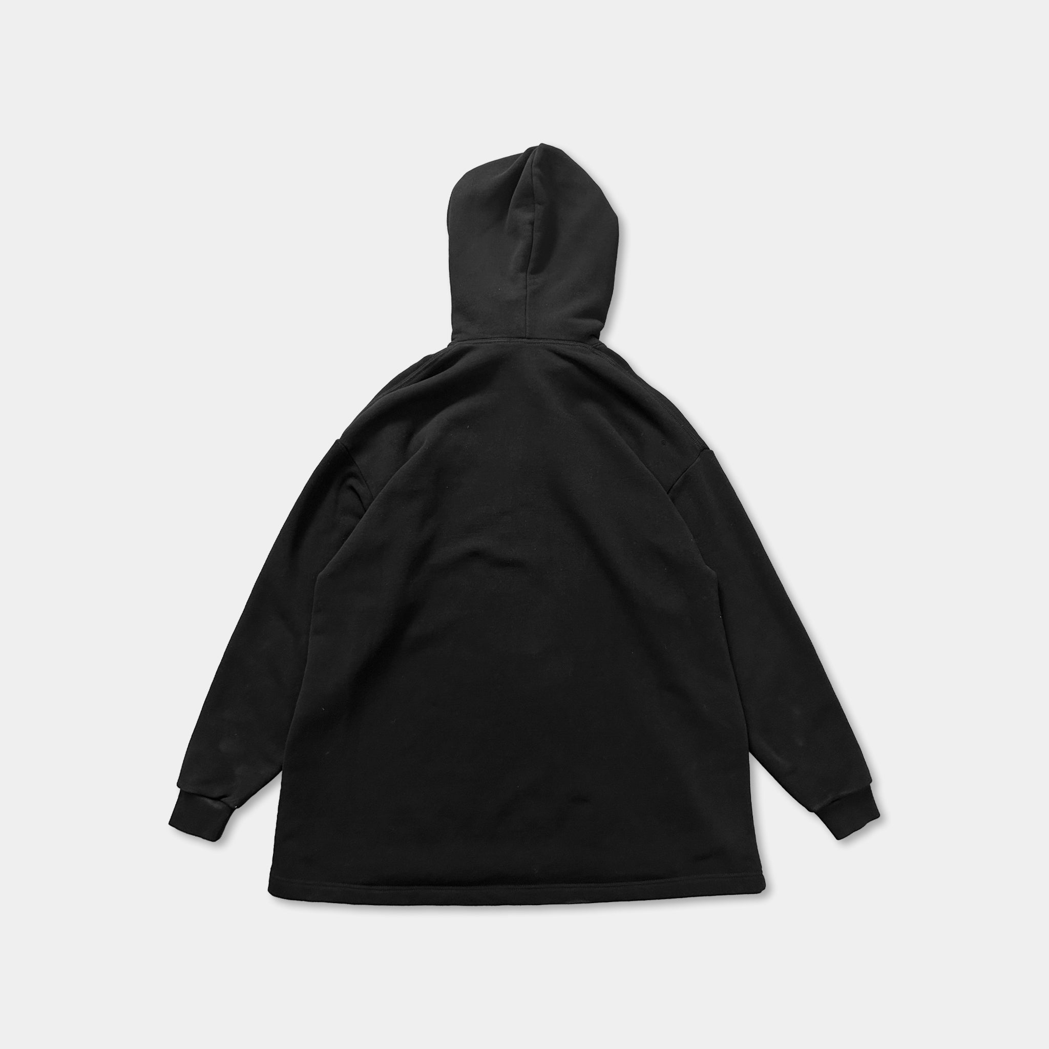 A black hooded sweatshirt is shown against a white background.