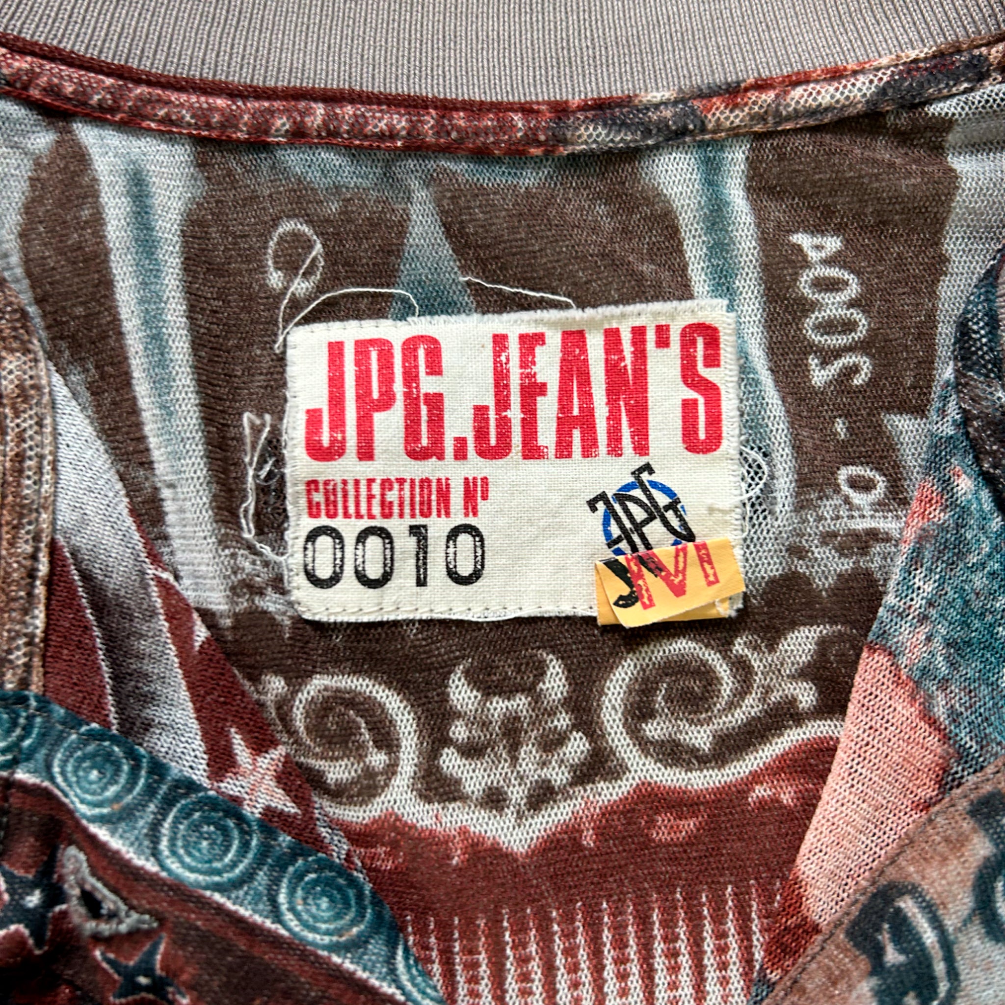 a close-up view of a fabric with a label that reads "JPG.Jean's Collection No. 0010".