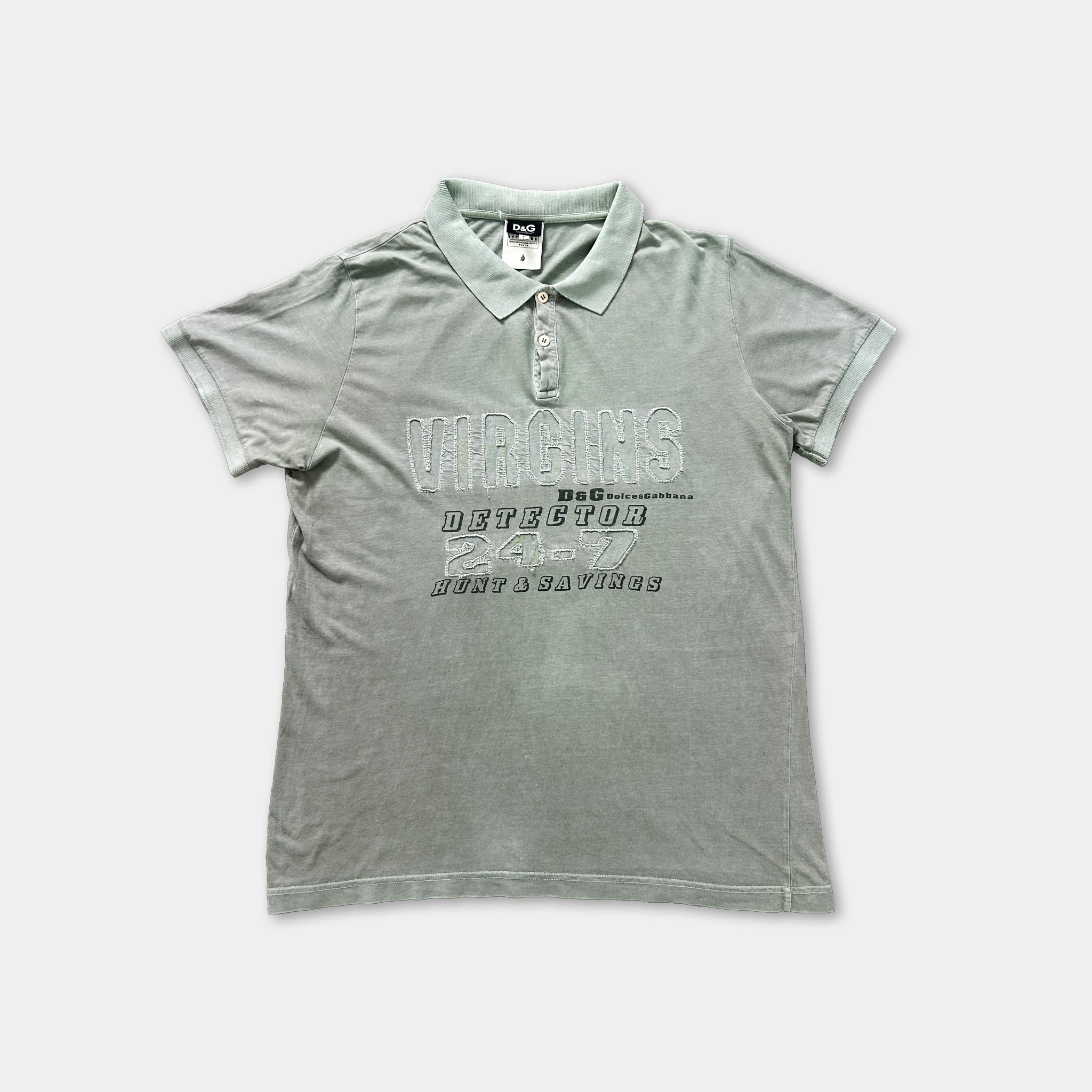 A light green polo shirt with the text "VIRGIN'S DETECTOR 24/7" printed on it.