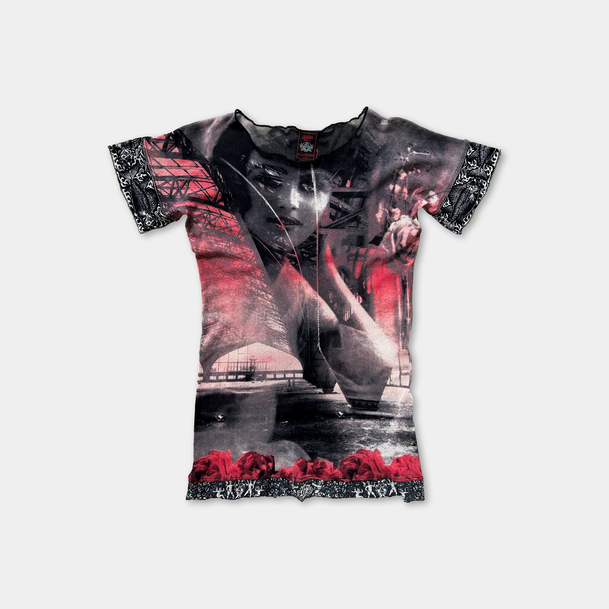 a black and red printed dress with a large graphic design on the front.
