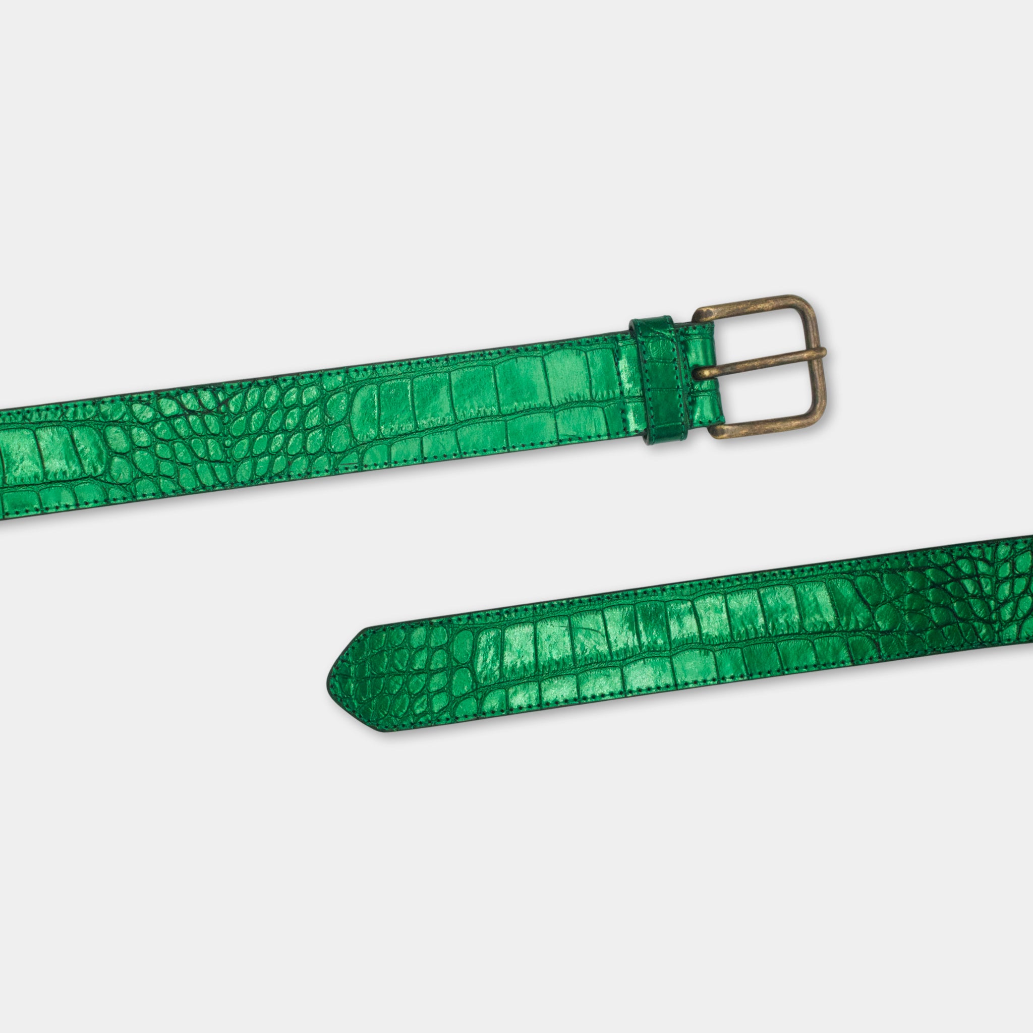 A pair of green leather belts with a crocodile skin texture.
