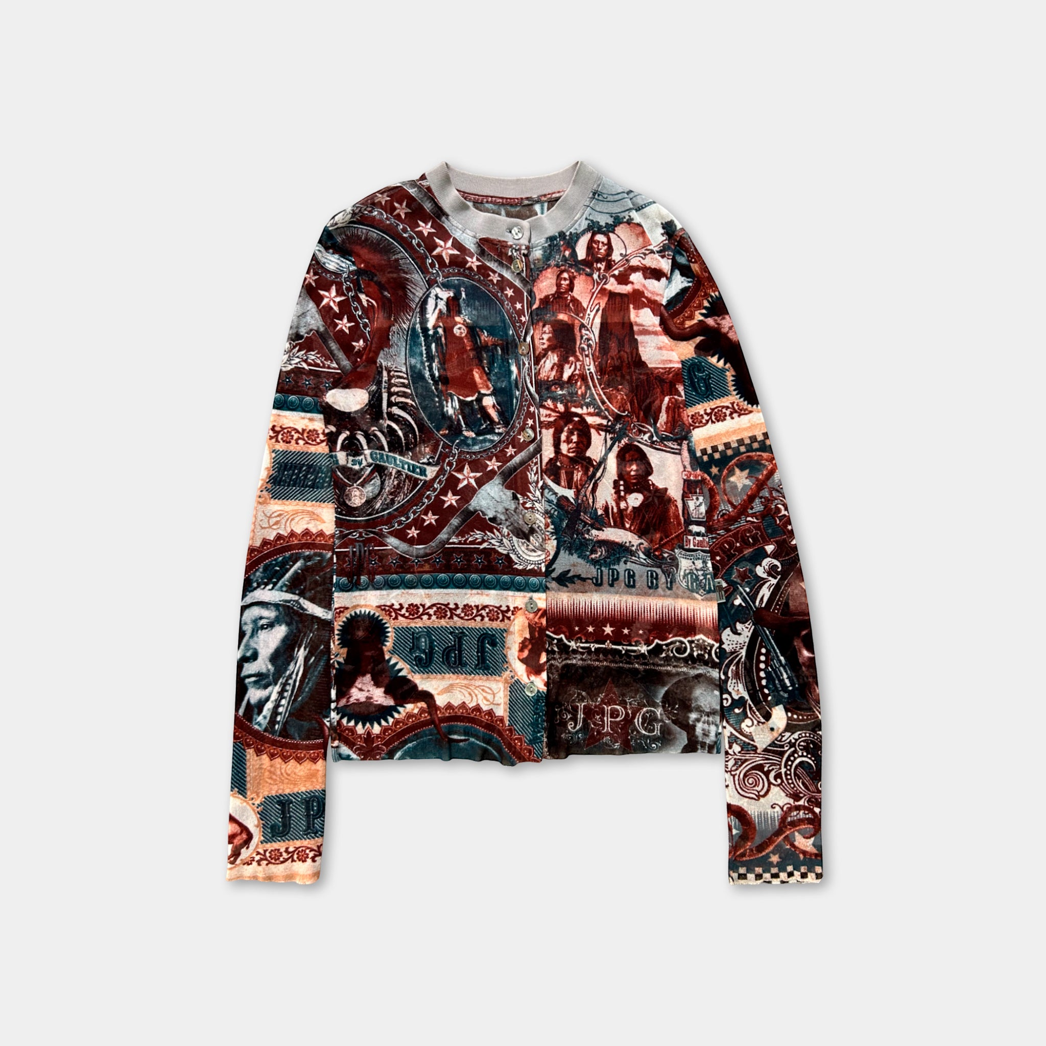 a long-sleeved top with a colorful, intricate pattern of various images and designs.