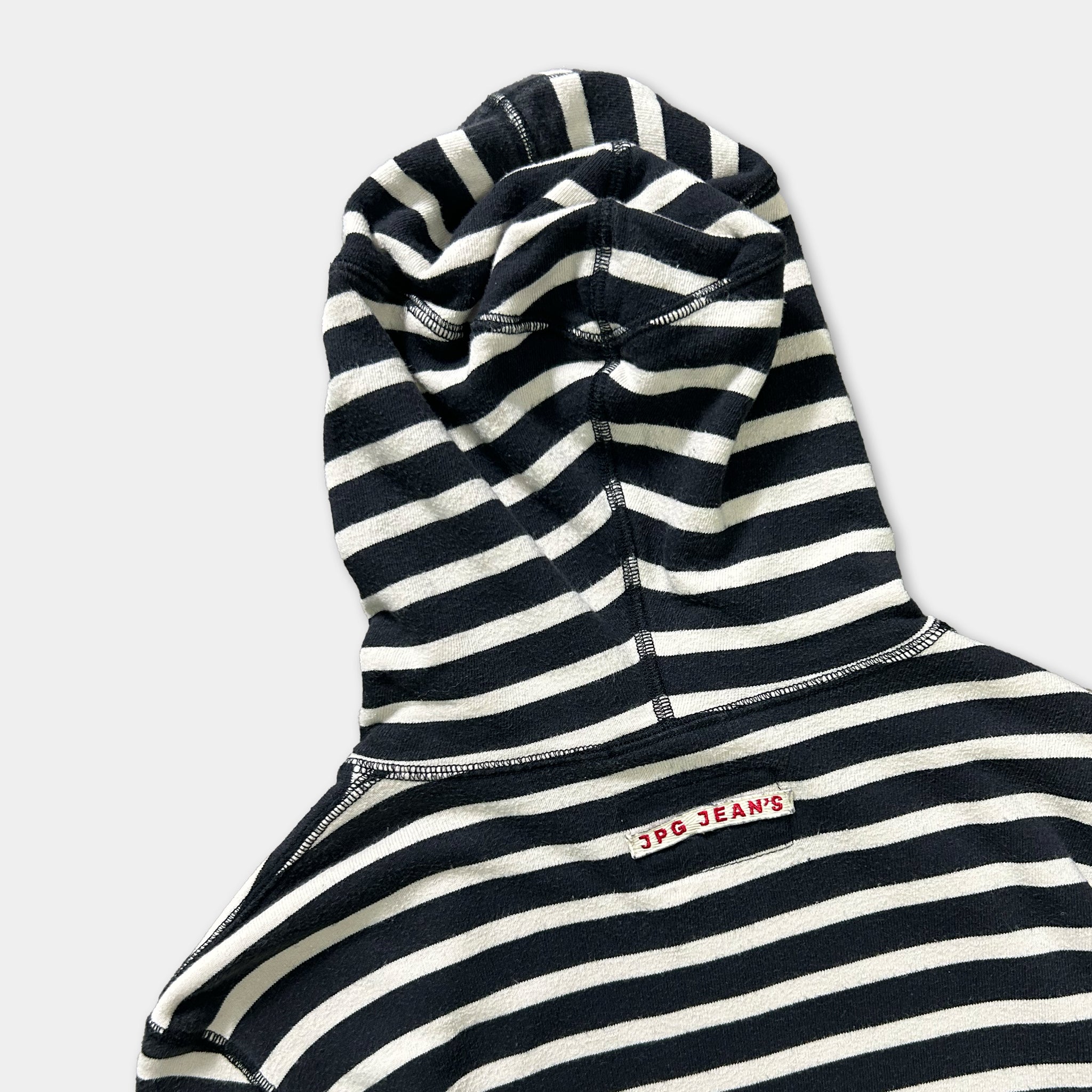 A black and white striped hoodie with the text "3PJ Jeans" printed on it.