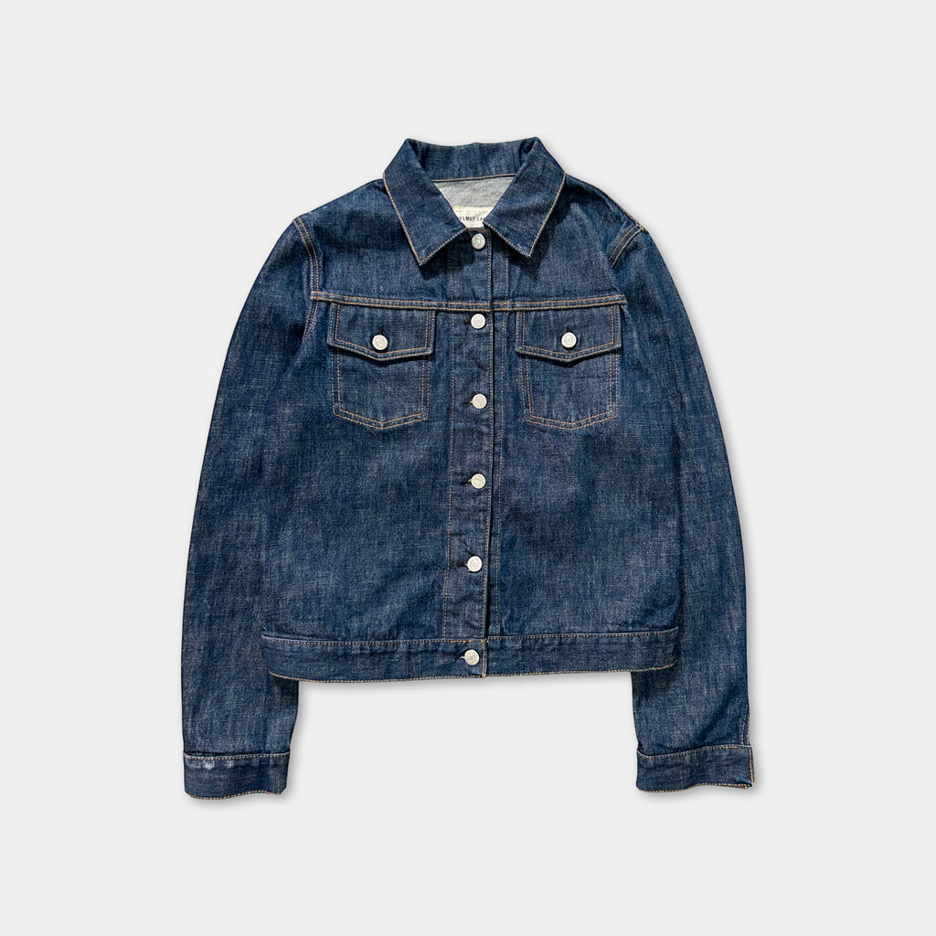 A denim jacket with a button-down front and long sleeves, displayed against a white background.