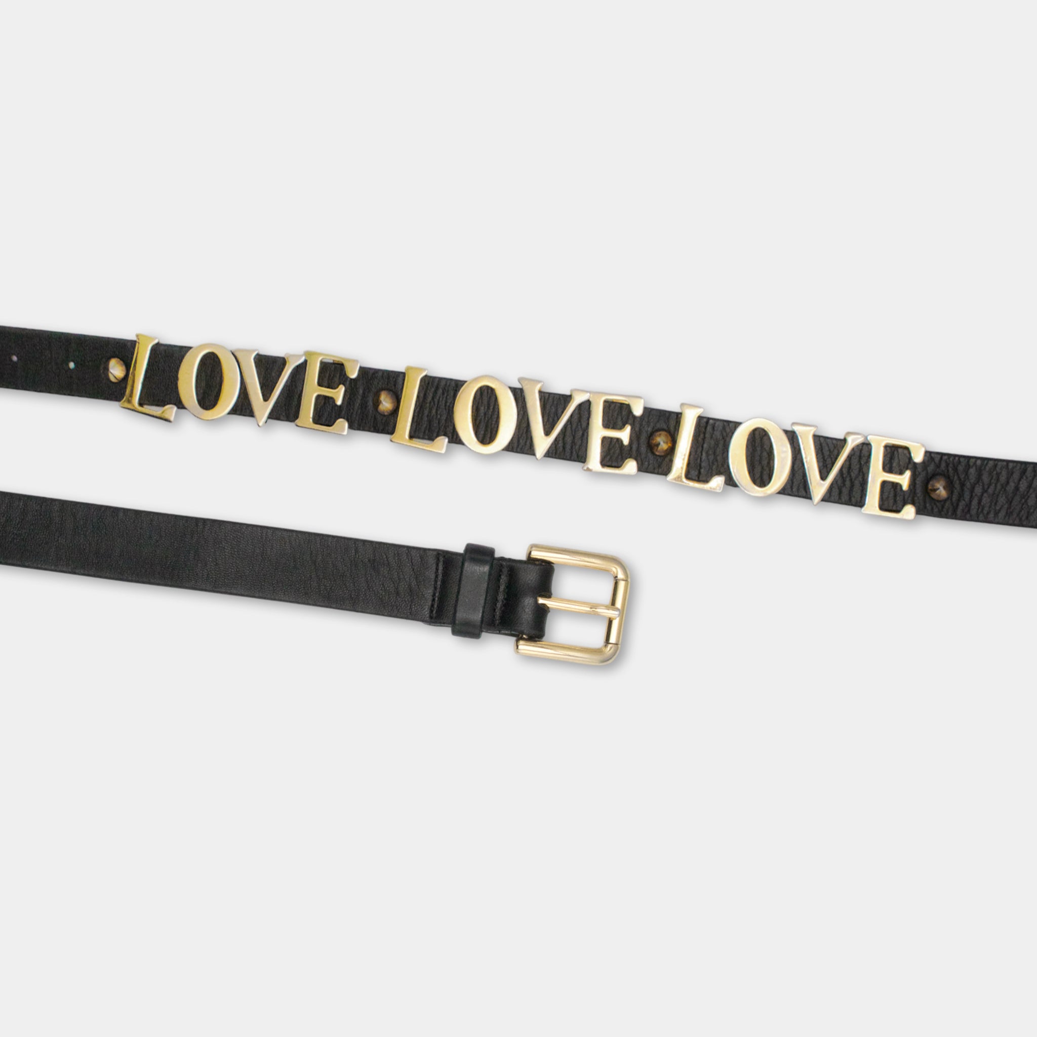 A black leather belt with gold lettering that says "LOVE LOVE" on it.