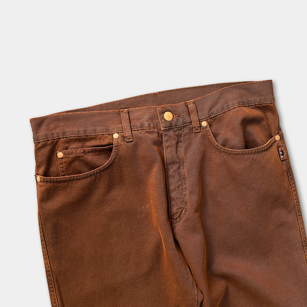 A pair of brown jeans with a button waistband and pockets.