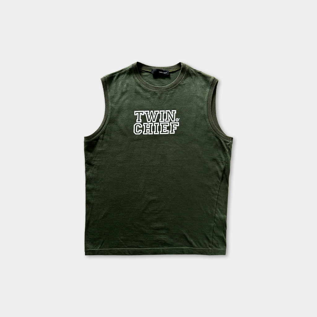 A dark green sleeveless t-shirt with the text "TWIN CHIEF" printed on it in white letters.