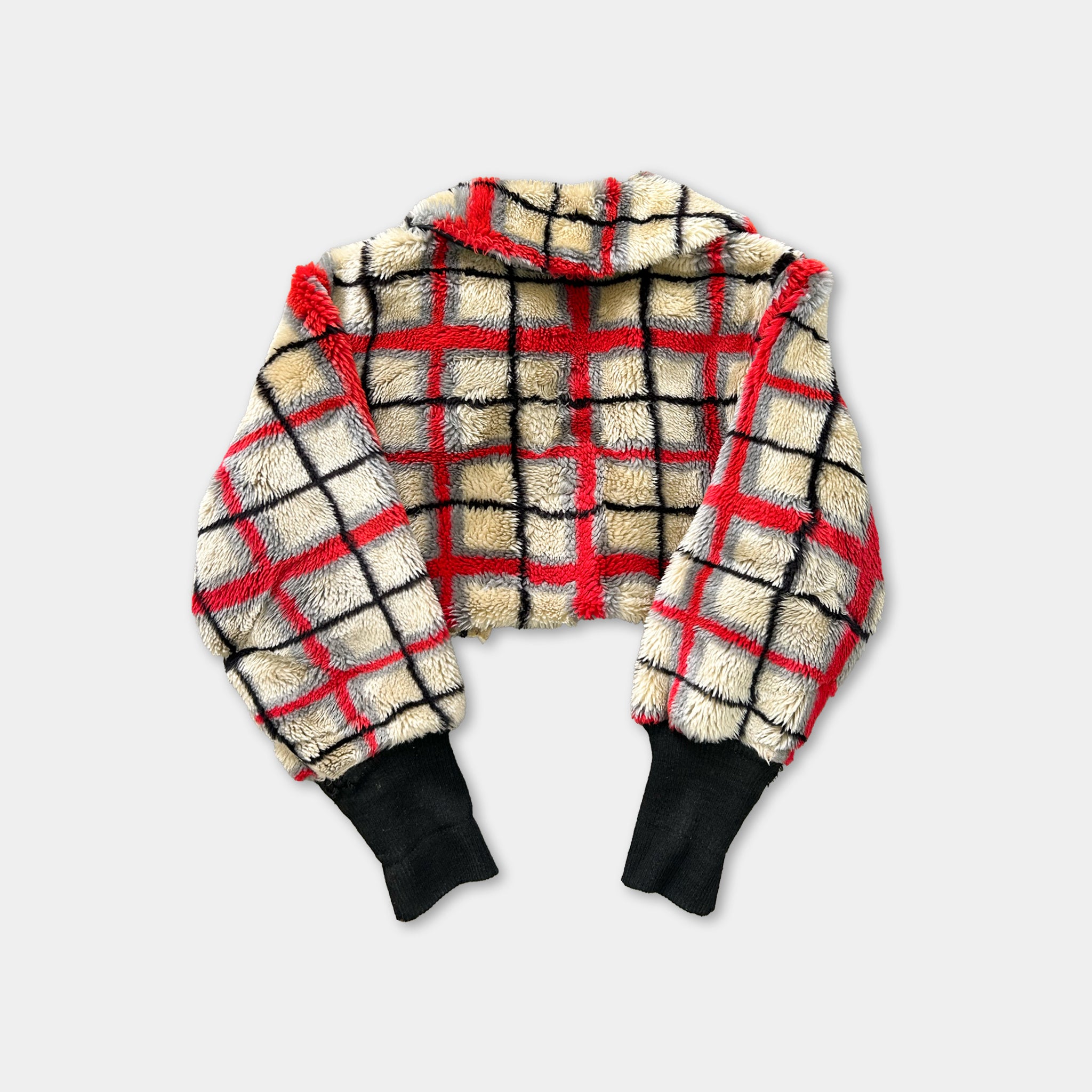 A red and black plaid jacket with a high collar and long sleeves, displayed against a plain background.