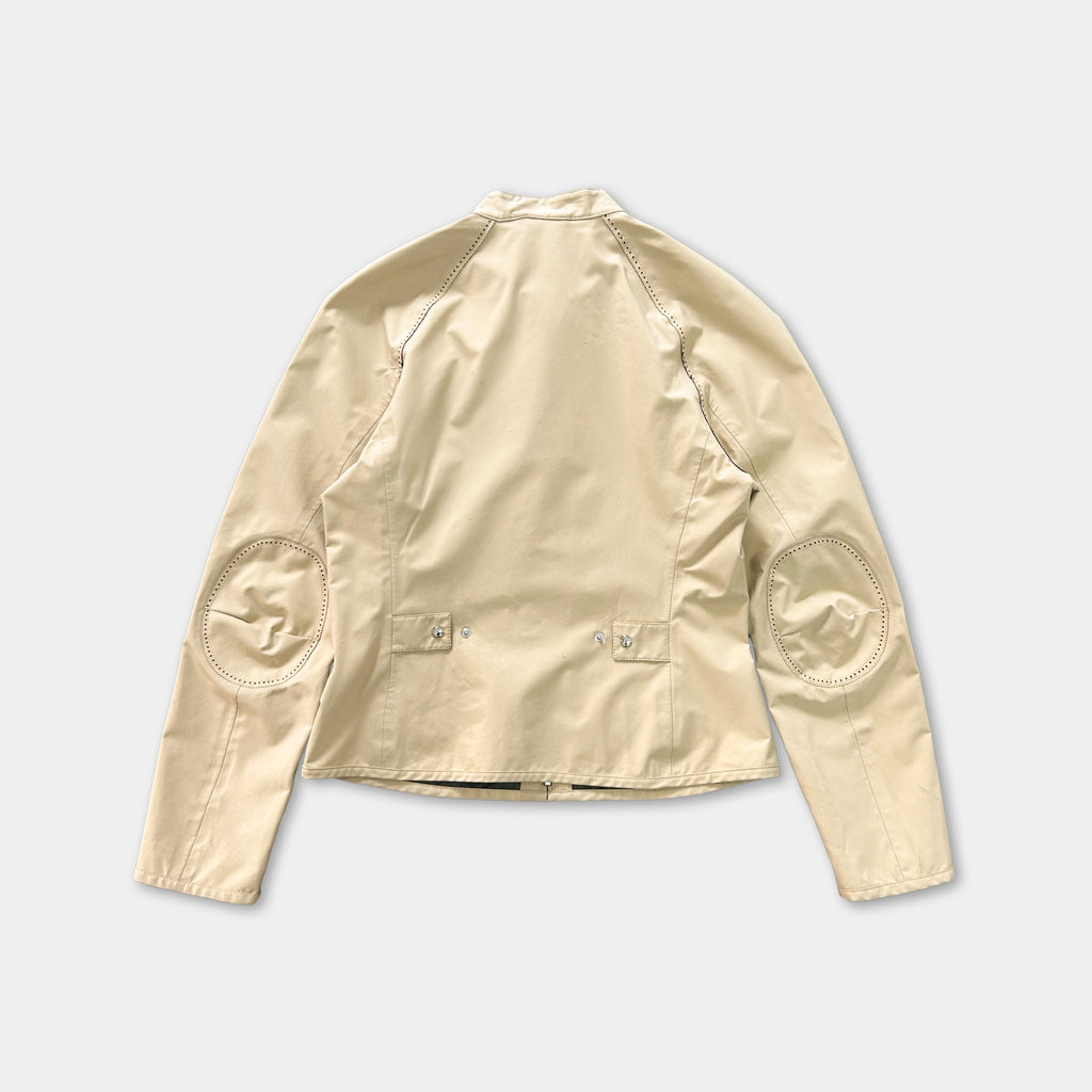 A beige jacket with two pockets and a zipper closure is shown against a white background.