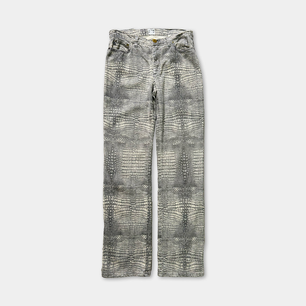 A pair of gray and white patterned jeans with a crocodile skin texture.