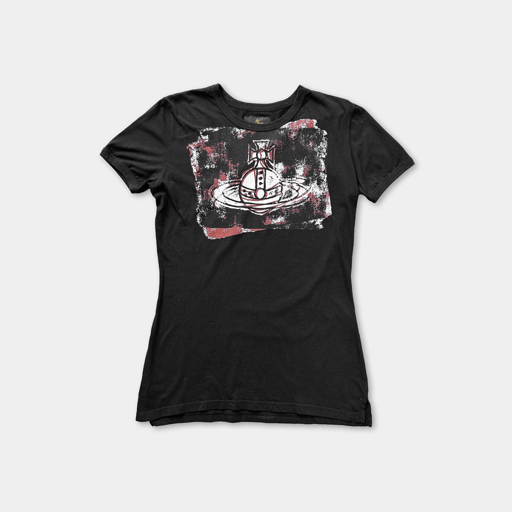 A black t-shirt with a graphic design featuring a stylized figure or character.